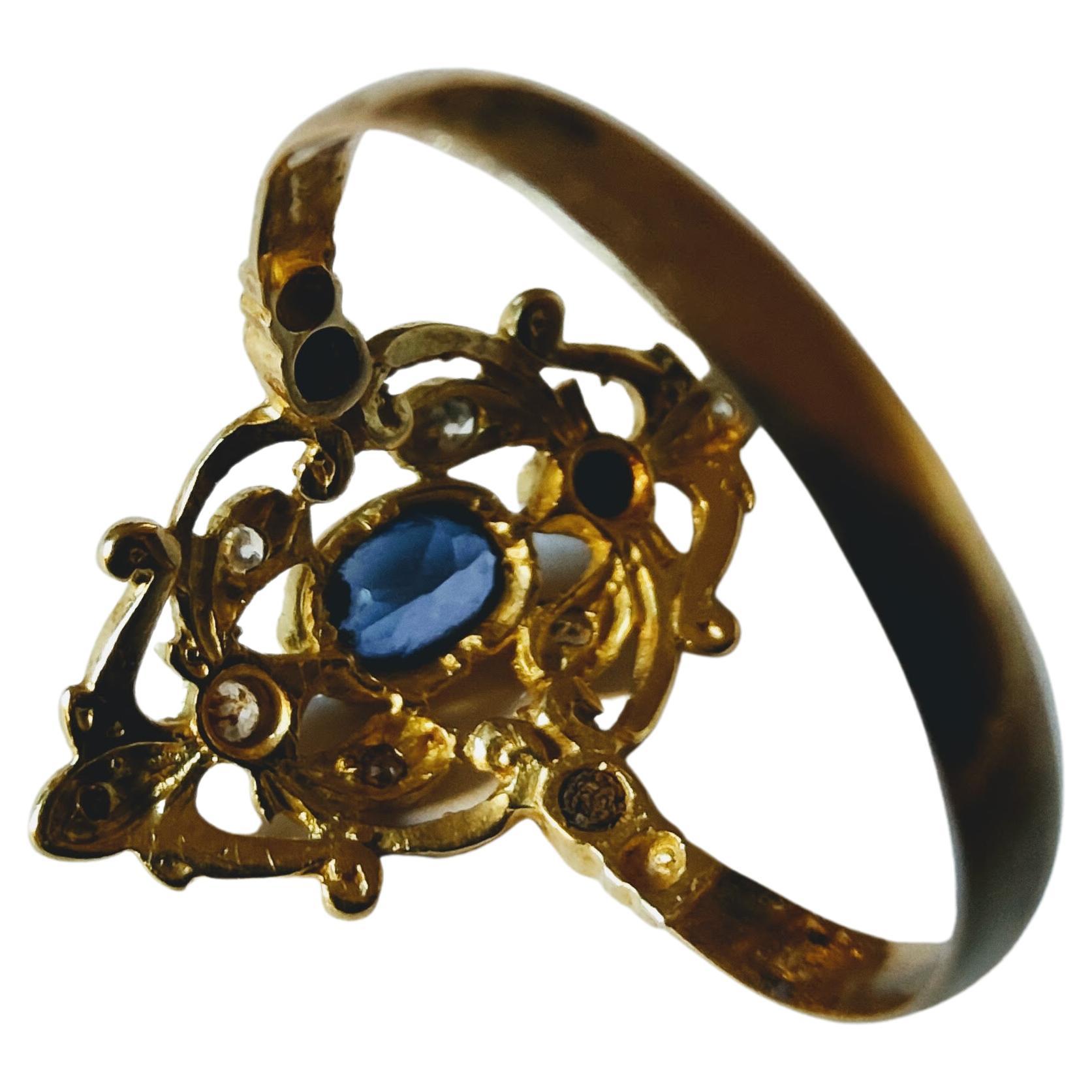 Oval Cut Vintage Antique Shuttle Ring  Circa 1900s Sapphire and Diamonds Yellow Gold 18K For Sale