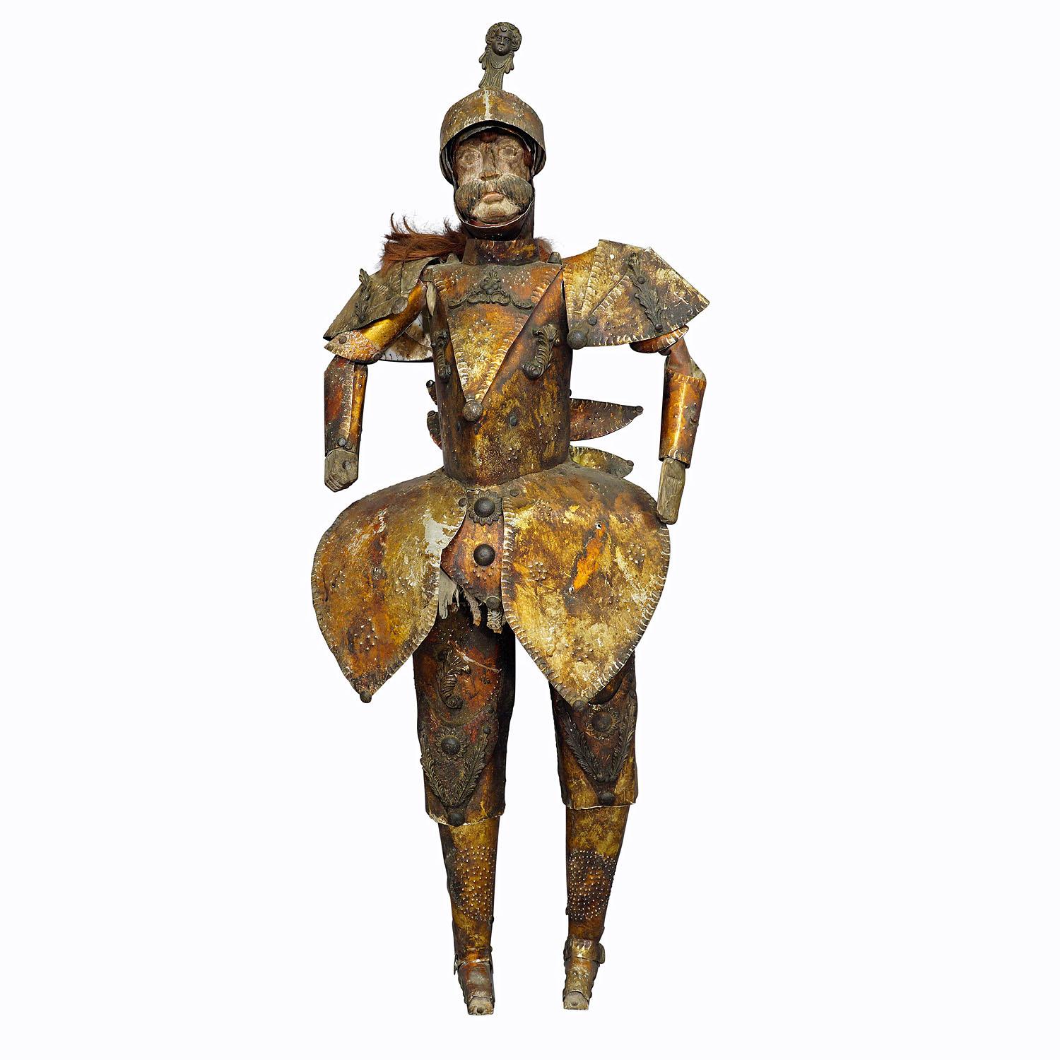 Antique Sicilian Opera dei Pupi Theater Marionette, ca. 1930s

A large Sicilian theater (Opera dei Pupi) marionette, which is made of tin, wood and canvas ca. 1930s.

The Sicilian Puppet Theater developed in the first half of the 19th century. It