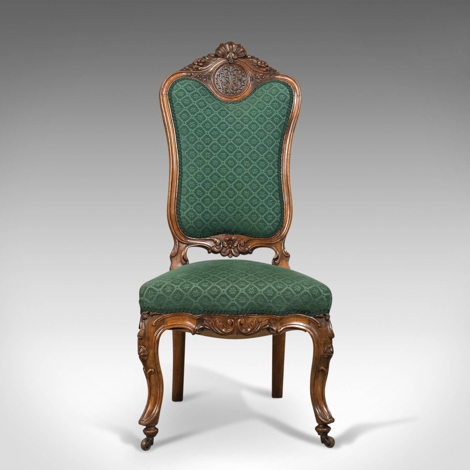 This is an antique side chair, a 19th century nursing or salon chair in English walnut dating to the early 19th century, circa 1820.

A superior example in fine condition
The English walnut frame displaying good colour, grain interest and a