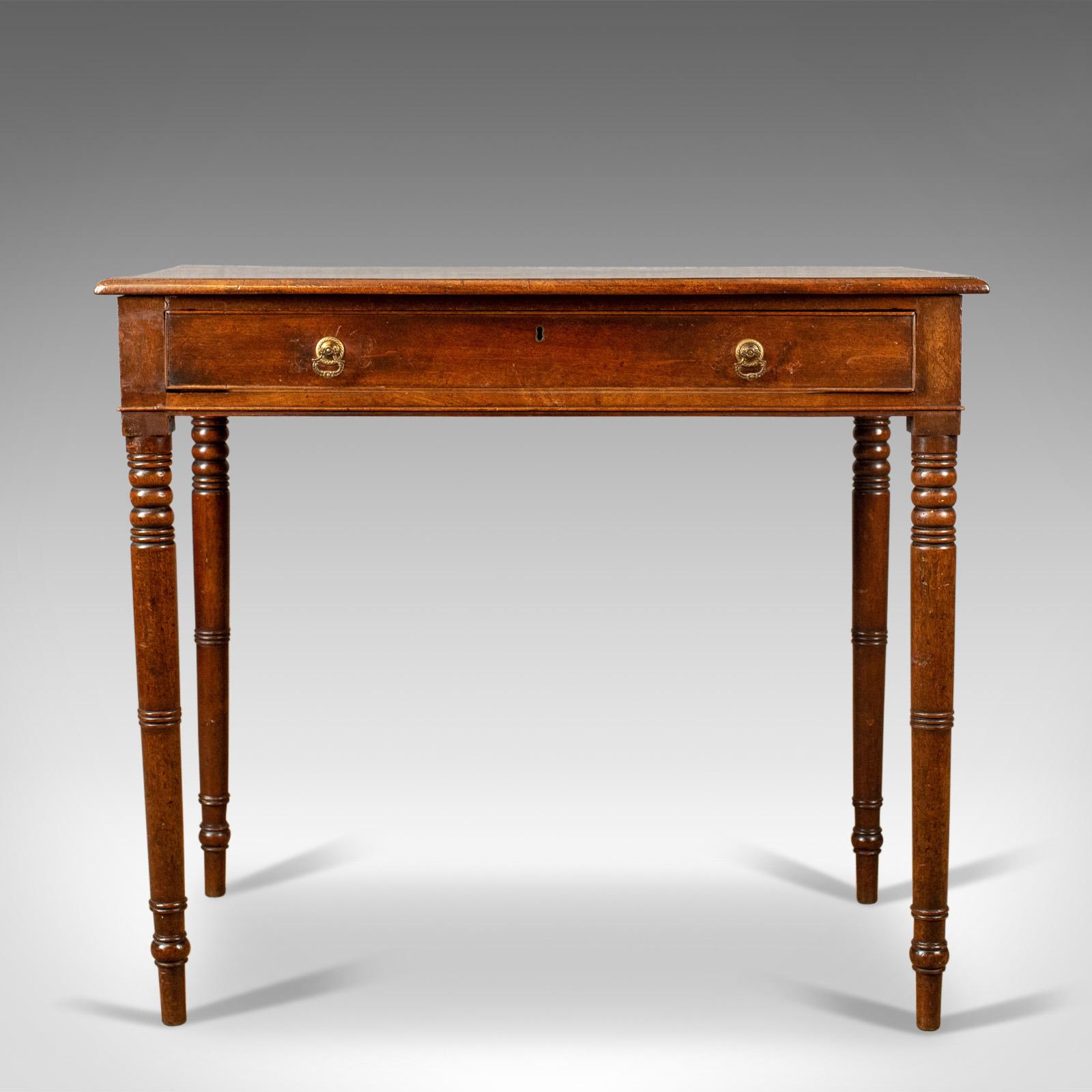This is an antique side table, an English, Georgian, mahogany, bow fronted console table dating to circa 1800.

An attractive bow fronted side table with elegant lines and in good proportion 
Warm russet hues and grain interest in the wax