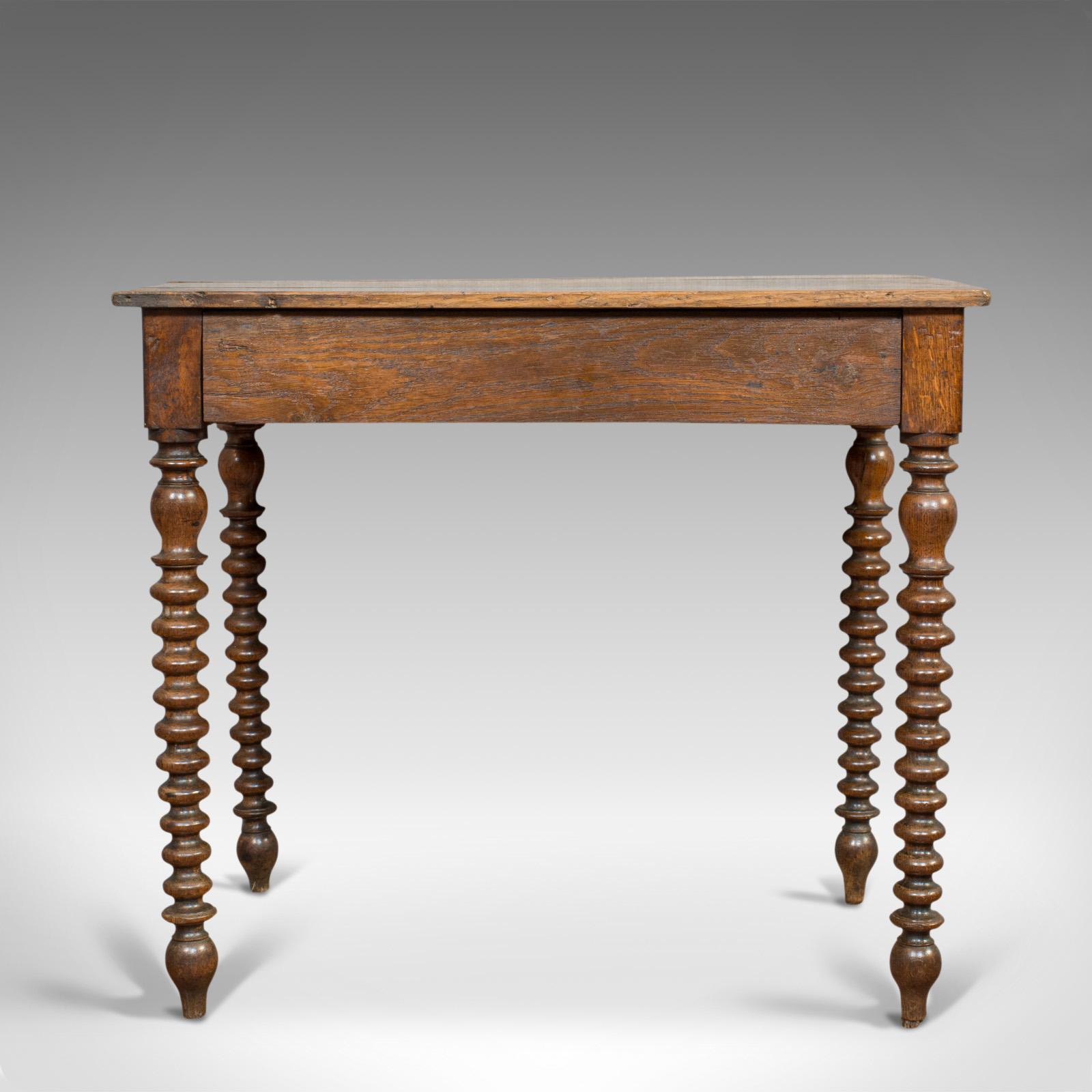 This is an antique side table. An English, oak desk or occasional table from the Georgian period, circa 1780.

Wonderful Georgian period table 
Displays a desirable aged patina - hugely characterful top, 
Smooth from years of waxing and showing