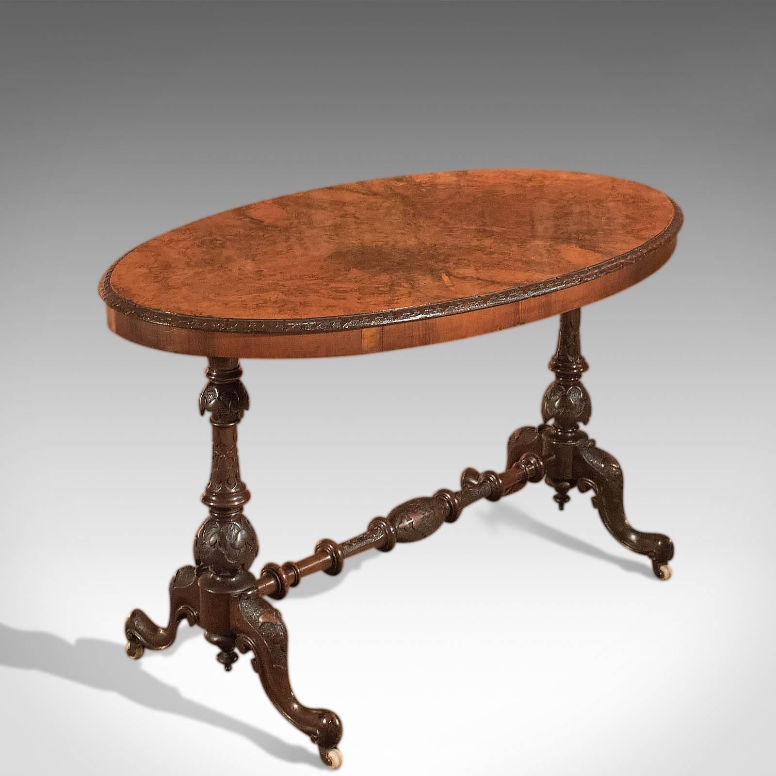 This is an antique, Victorian side table dating to the late 19th century, circa 1870.

A superior example, the burr walnut grain detail is exquisitely displayed in the quarter veneered, book-matched top. A carved moulded edge in a contrasting