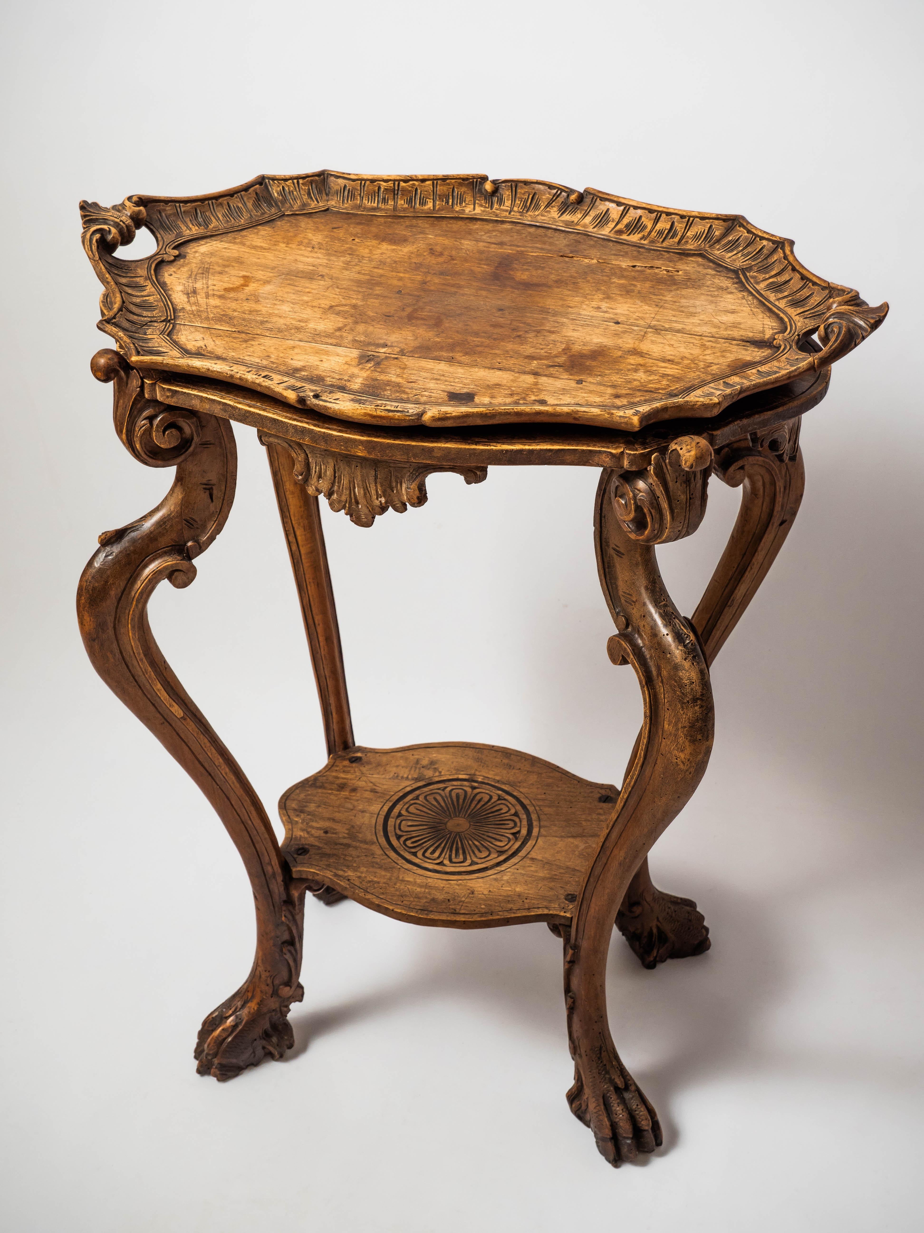 Antique side table with tray

We present to you a unique antique side table with a richly carved tray, which is made of quality walnut wood. Dating from around 1900, this side table is a gem of handcraft and an elegant addition to any interior.

Key