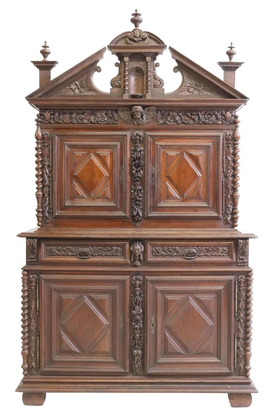Gorgeous Antique Sideboard, French Louis XIII Style Geometric, Carved, 18th C., 1700s!!

French Louis XIII style sideboard, 18th / 19th century, having pediment crest, the whole carved with foliates and protruding masks, geometric paneled cabinet