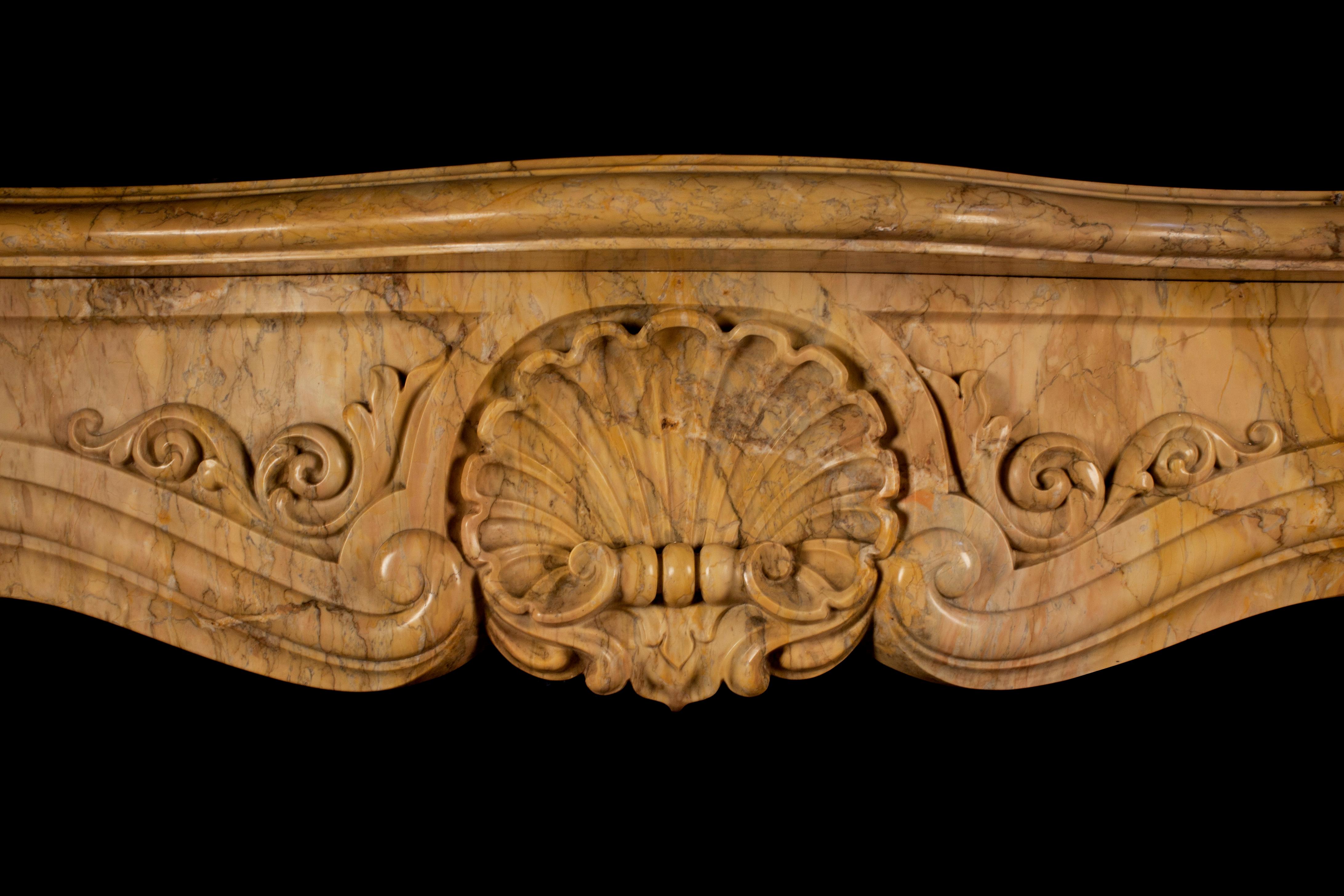 British Antique Sienna Marble Fireplace in the Rococo Revival Style For Sale