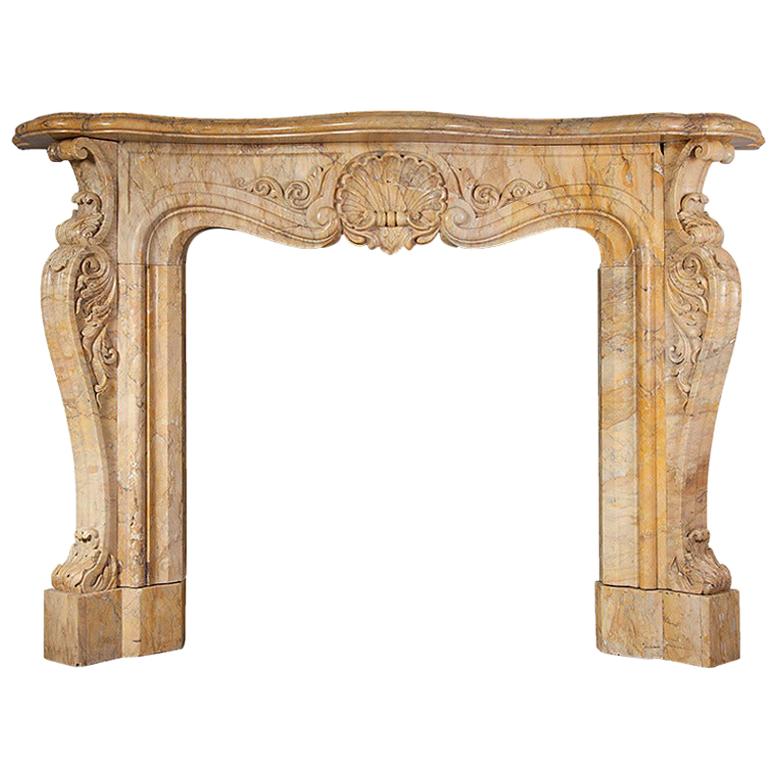 Antique Sienna Marble Fireplace in the Rococo Revival Style For Sale
