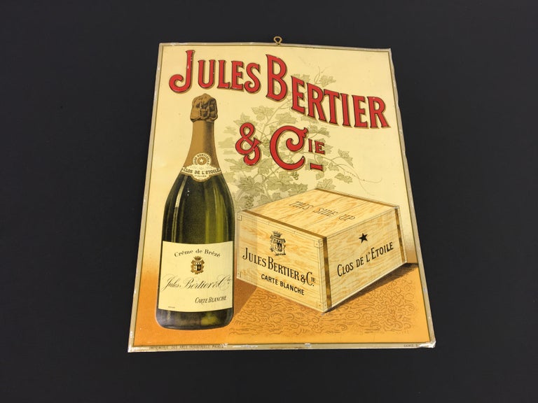 Antique French Champagne Sign circa 1900. 
This Art Nouveau metal sign or tin sign was made for Wine & Champagne House Jules Bertier & Cie, Brest, France. 
It's an embossed sign with a bottle of sparkling wine alongside a wooden storage or