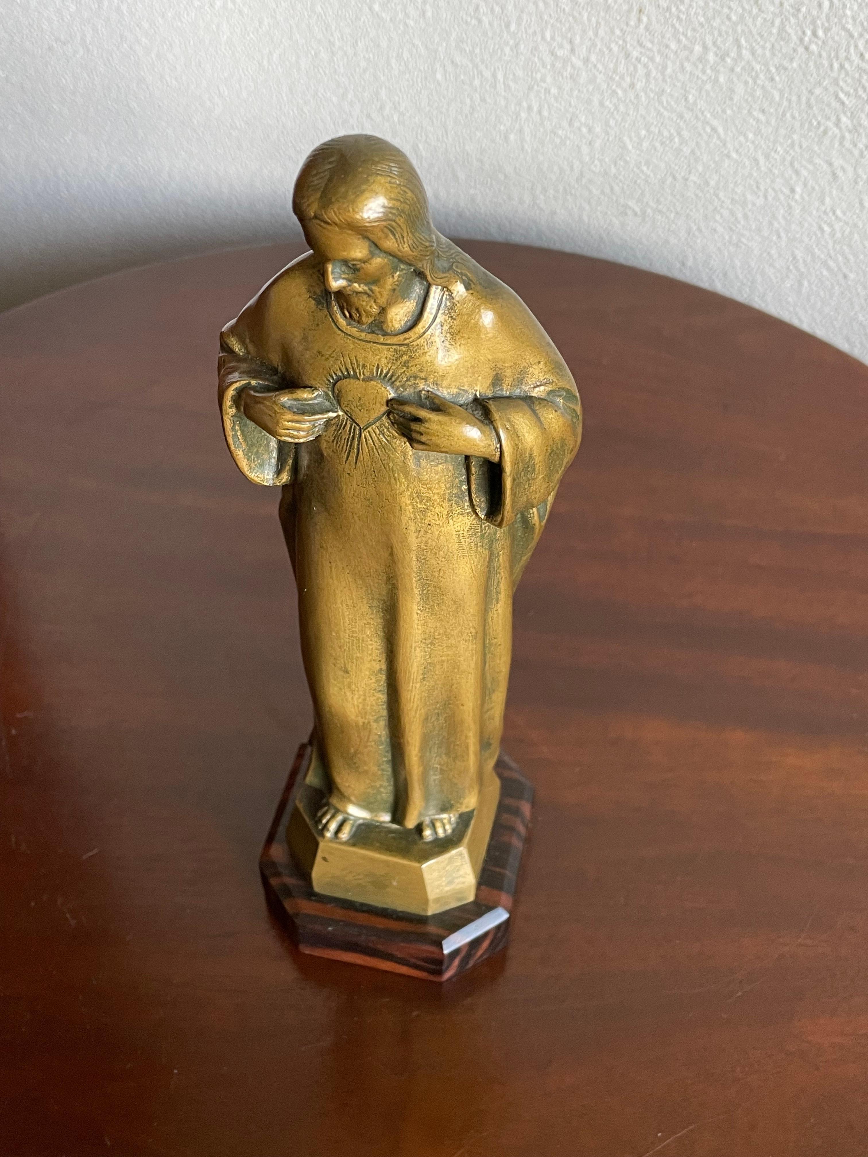 European Art Deco Signed Bronze Sculpture of Christ w. Geometrical Coromandel Wooden Base For Sale