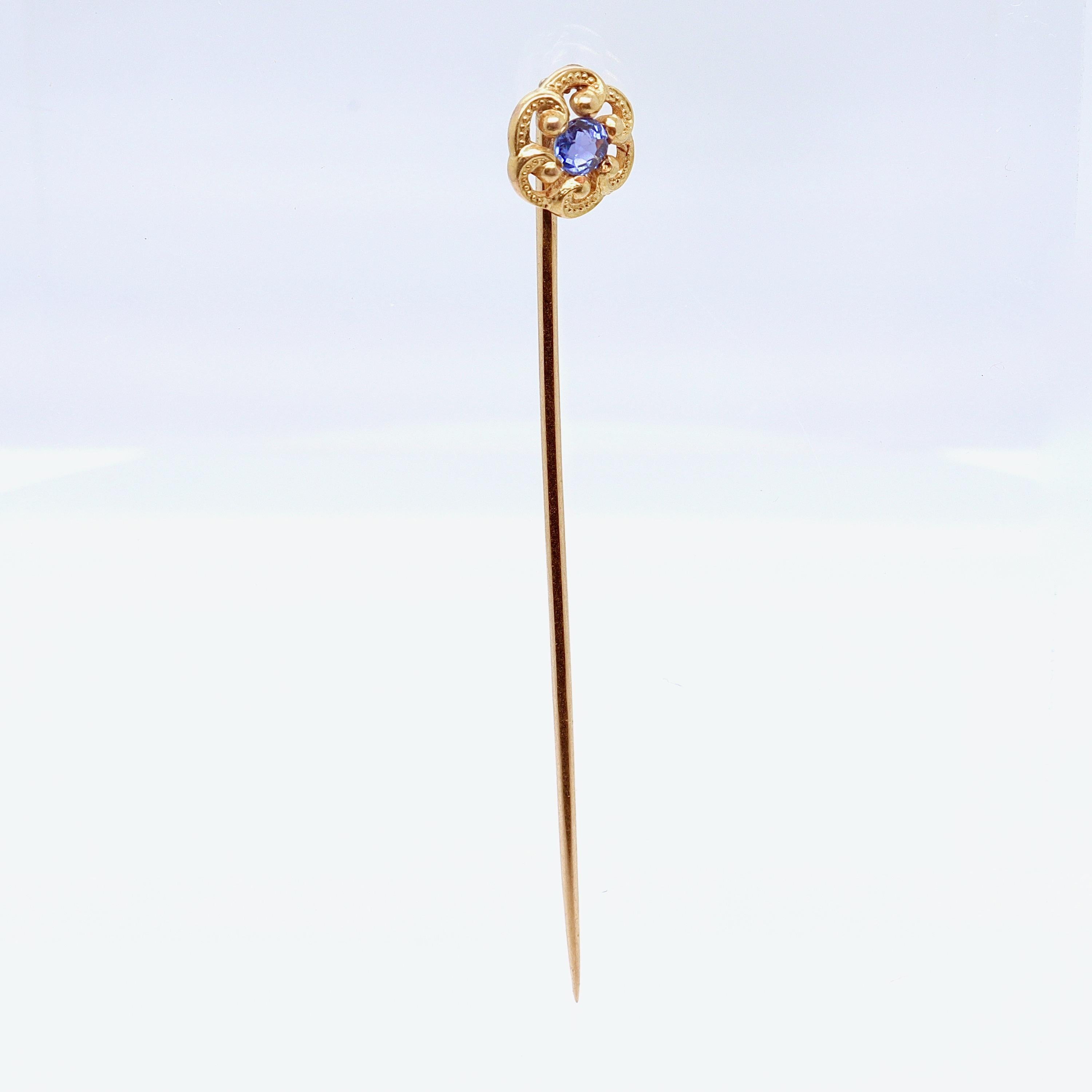 A fine Edwardian stick pin.

By Marcus & Co.

In 14 karat yellow gold with a small, round faceted blue sapphire.

Simply a wonderful signed antique stick pin!

Date:
Early 20th Century

Overall Condition:
It is in overall good, as-pictured, used