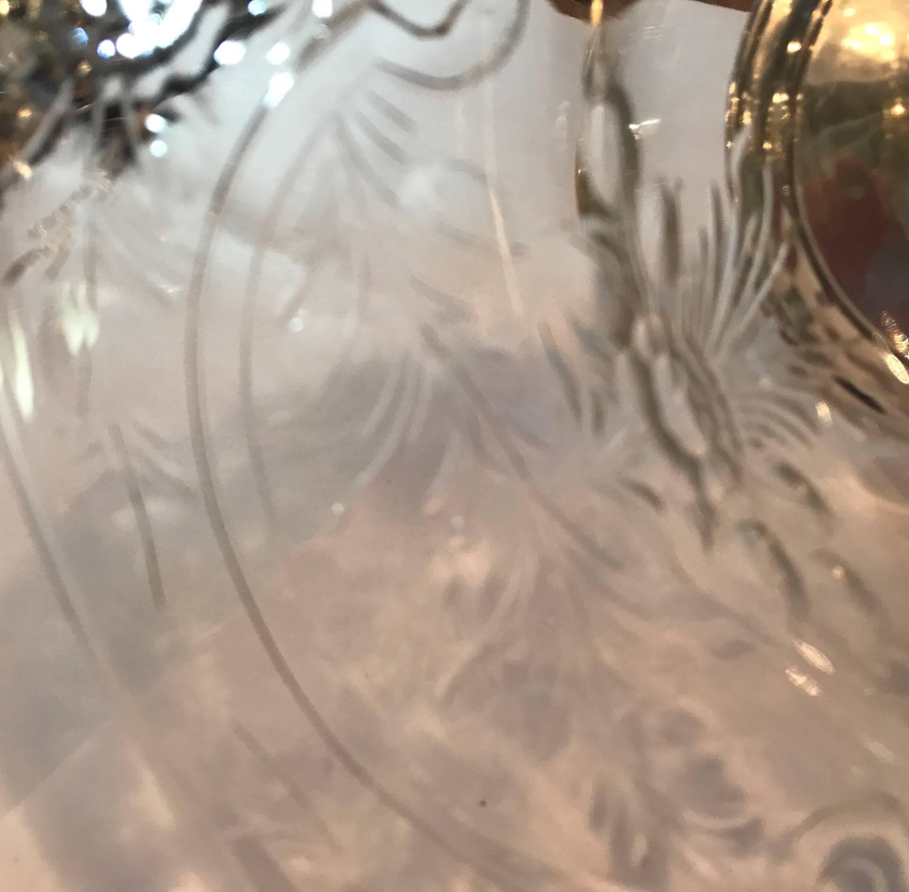 Intaglio cut glass centre bowl with sterling silver pedestal base signed by Hawkes.
Thomas Gibbons Hawkes founded what was probably this country’s most successful factory devoted exclusively to the cutting of glass. It certainly had the longest