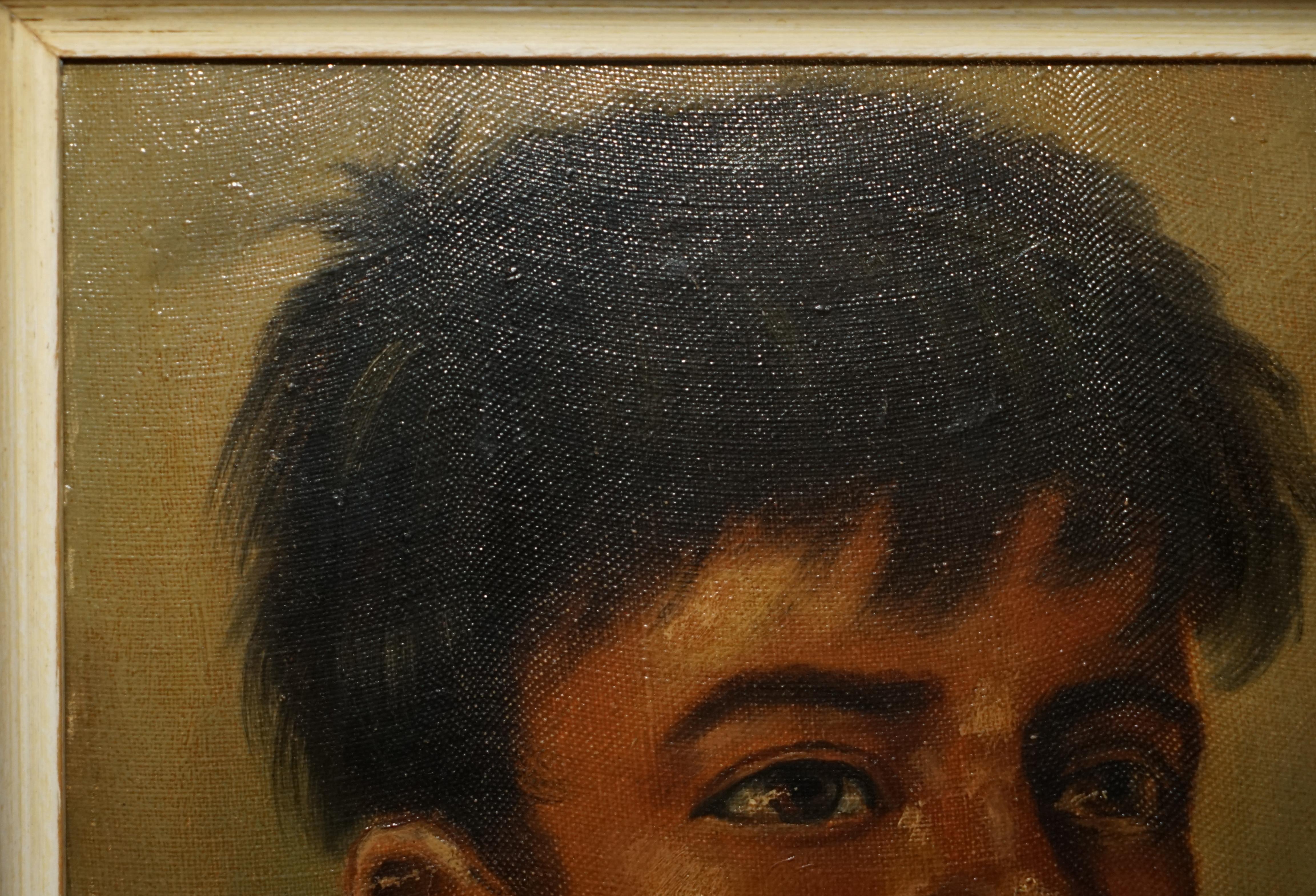 Peint à la main ANTIQUE PIÈCE D'OREILLE JANSON BELGIUM SIGNÉE SUR CANvas PAiNTING OF YOUNG BOY SMOKING en vente