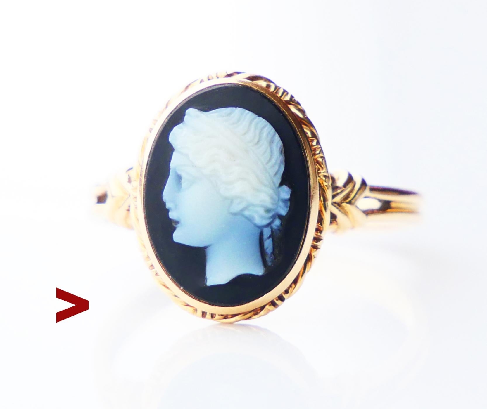 Antique Unisex signet ring dating to ca. XIX -early XX cent. Solid 18K Yellow Gold with fine cameo on banded Red Onyx depicting young Greek or Roman Woman wearing diadem.

Crown measures 13.5 mm x 11 mm x 6 mm deep . Cameo carved on solid Onyx stone