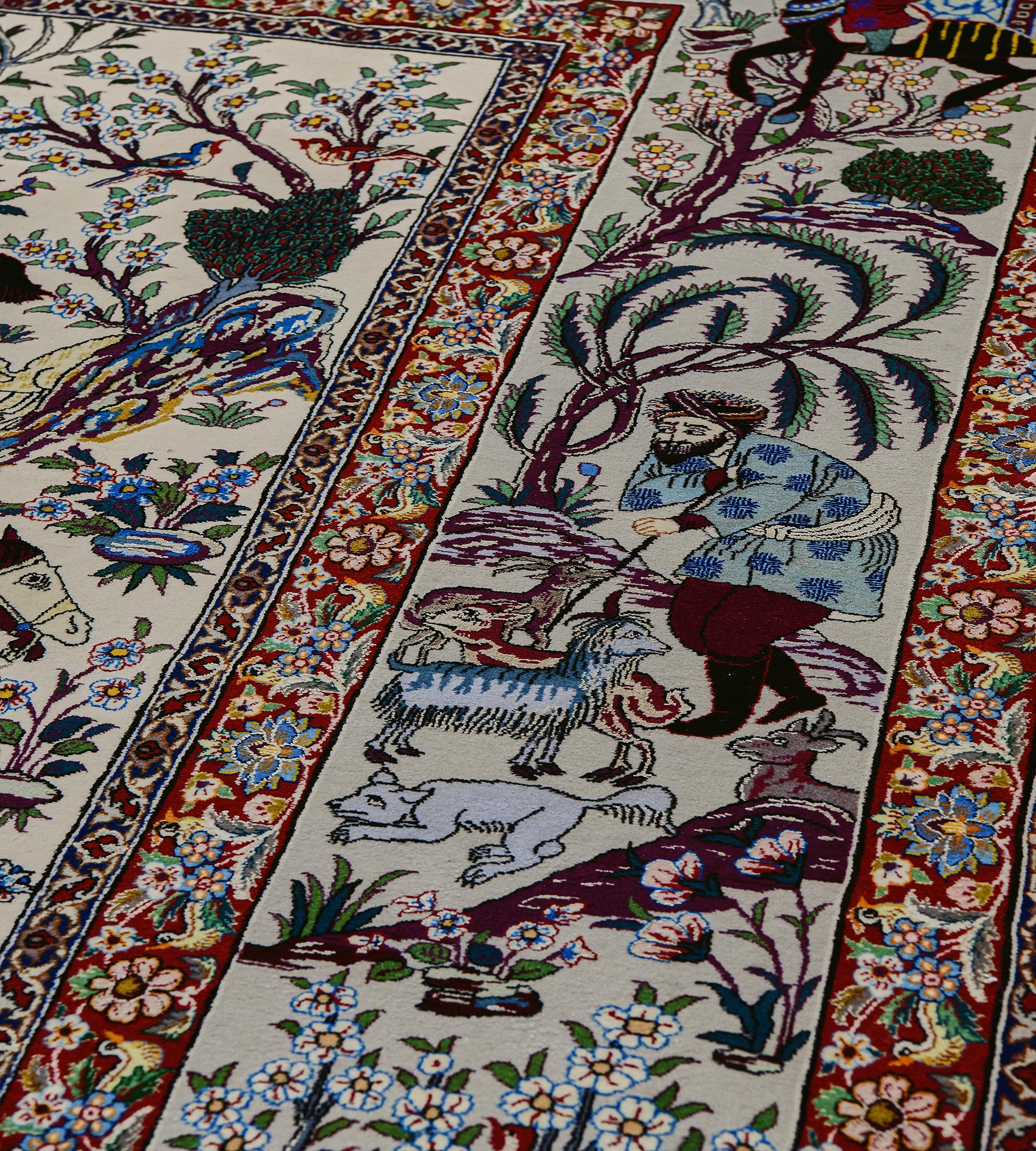 Alfombra antigua de seda y lana firmada Akbaroff Persa Isfahan Escena de caza siglo XX en venta