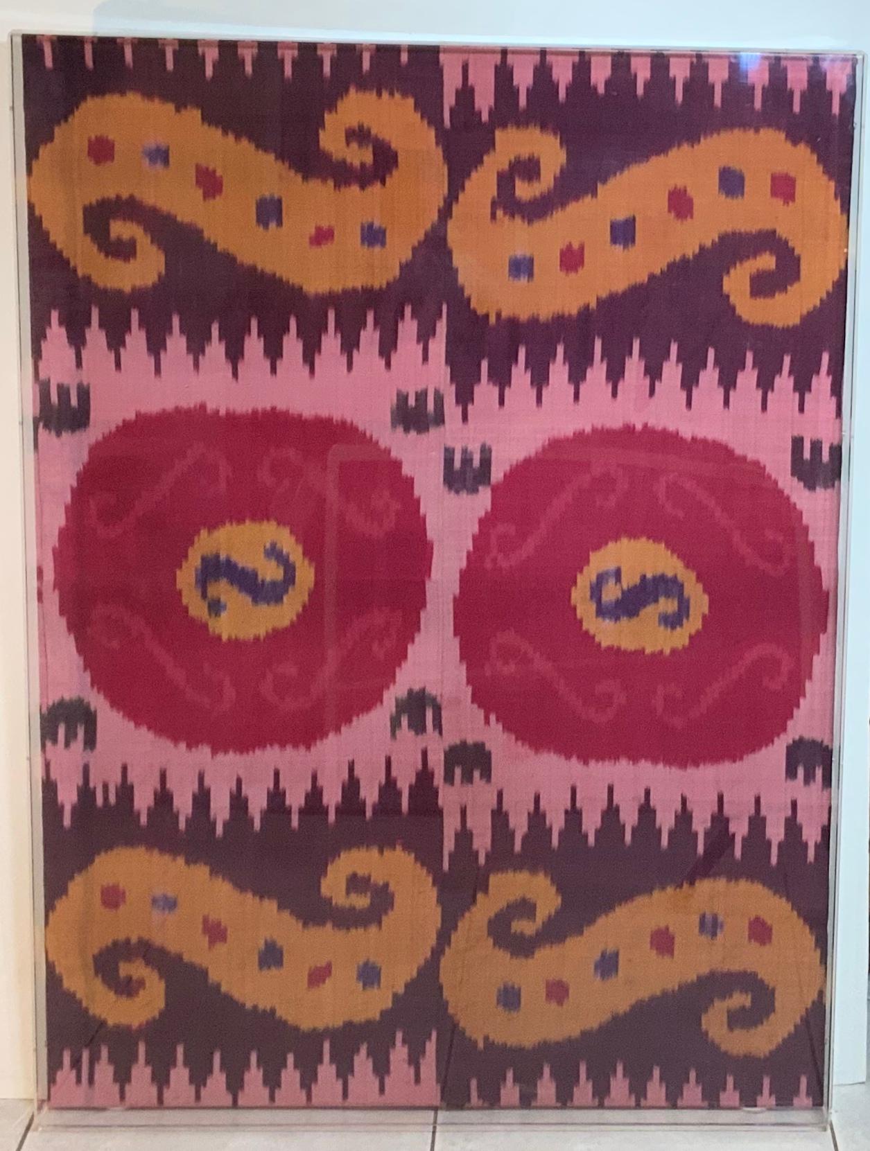 Beautiful antique silk Ikat from Uzbekistan with cheerful color as per tradition, all handmade by tribal man and female artists, this one is professionally mounted and displayed in Lucite shadow box and could be hang vertical or horizontal,