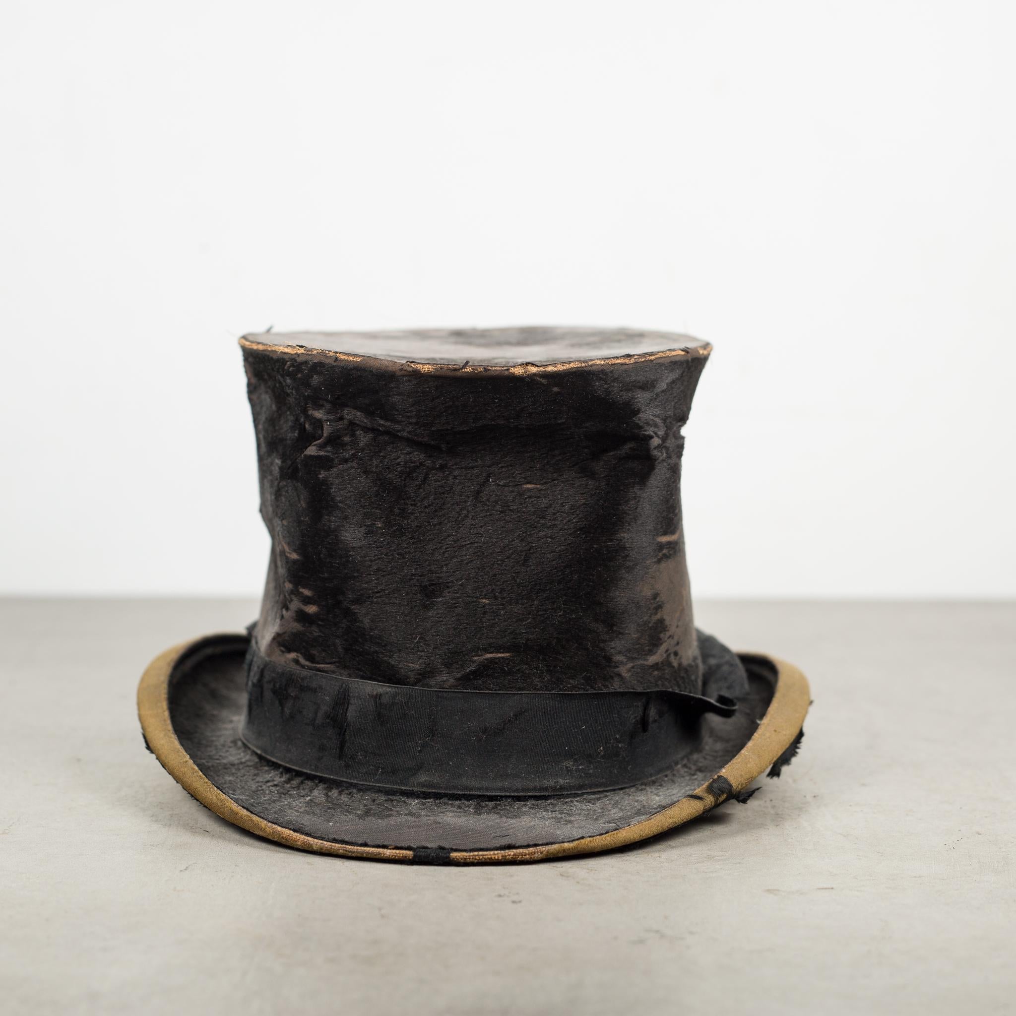 About

A distressed silk top hat.

Creator unknown.
Date of manufacture circa 1850-1900.
Materials and techniques silk.
Condition good. Wear consistent with age and use.
Dimensions hat: H 6 in., W 9.75 in., D 11.75 in., hat interior: 6.25 in