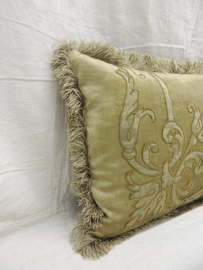 Antique silk velvet olive green applique decorative bolster pillow.
Silk brocade embroidered green silk threads and applied onto silk velvet.
Original silk brush trim from panel was used on pillows all around as trim.
(New) small check green and