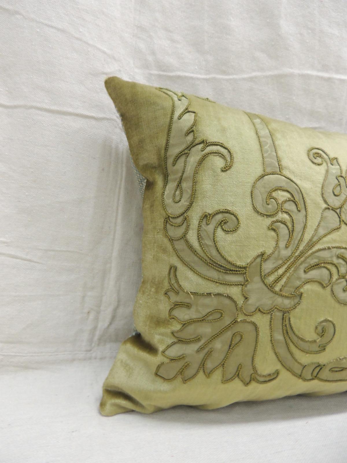 Antique silk velvet olive green applique decorative bolster pillow.
Silk brocade embroidered green silk threads and applied onto silk velvet.
(New) small check green and gold pattern was used on backings.
This textile was originally a table