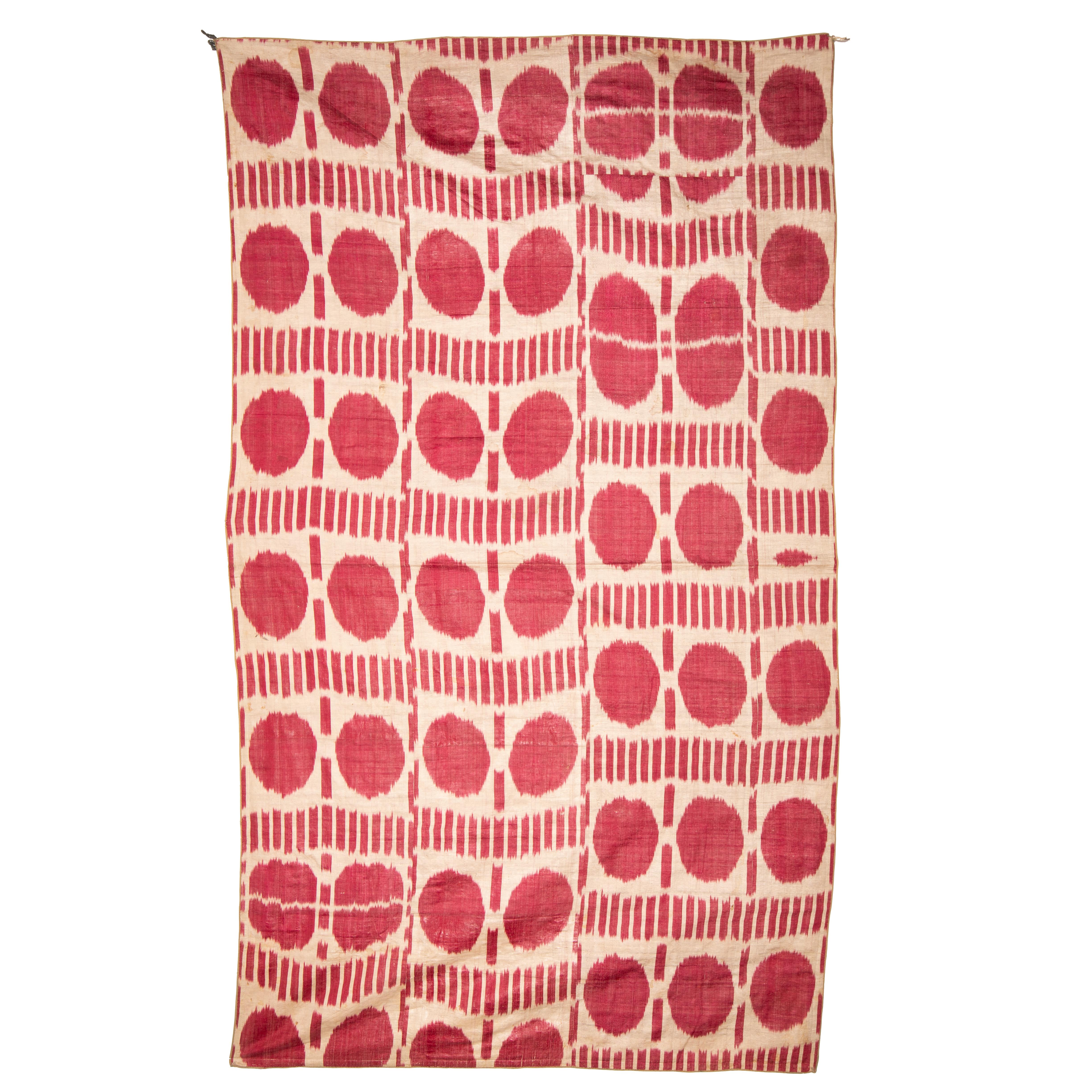 This is a rather simple, 2 color ikat panel duding back to the late 19th C. from Uzbekistan.
Has a plain red cotton lining.