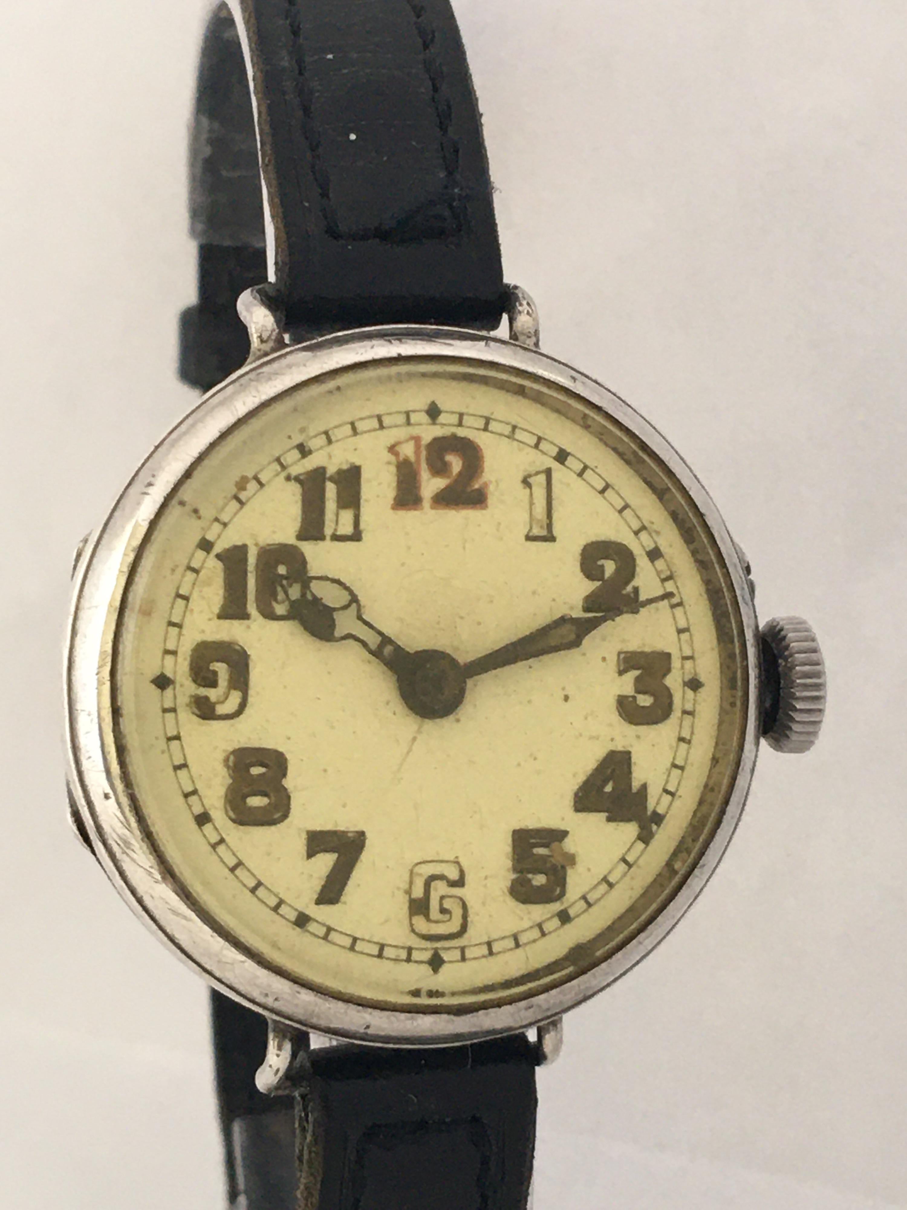 This beautiful antique silver trench watch is in good working condition and it is running well. 
There are some signs of ageing and wear with tiny scratches and dents on the watch case. There is some deterioration and tiny  hairline crack on the