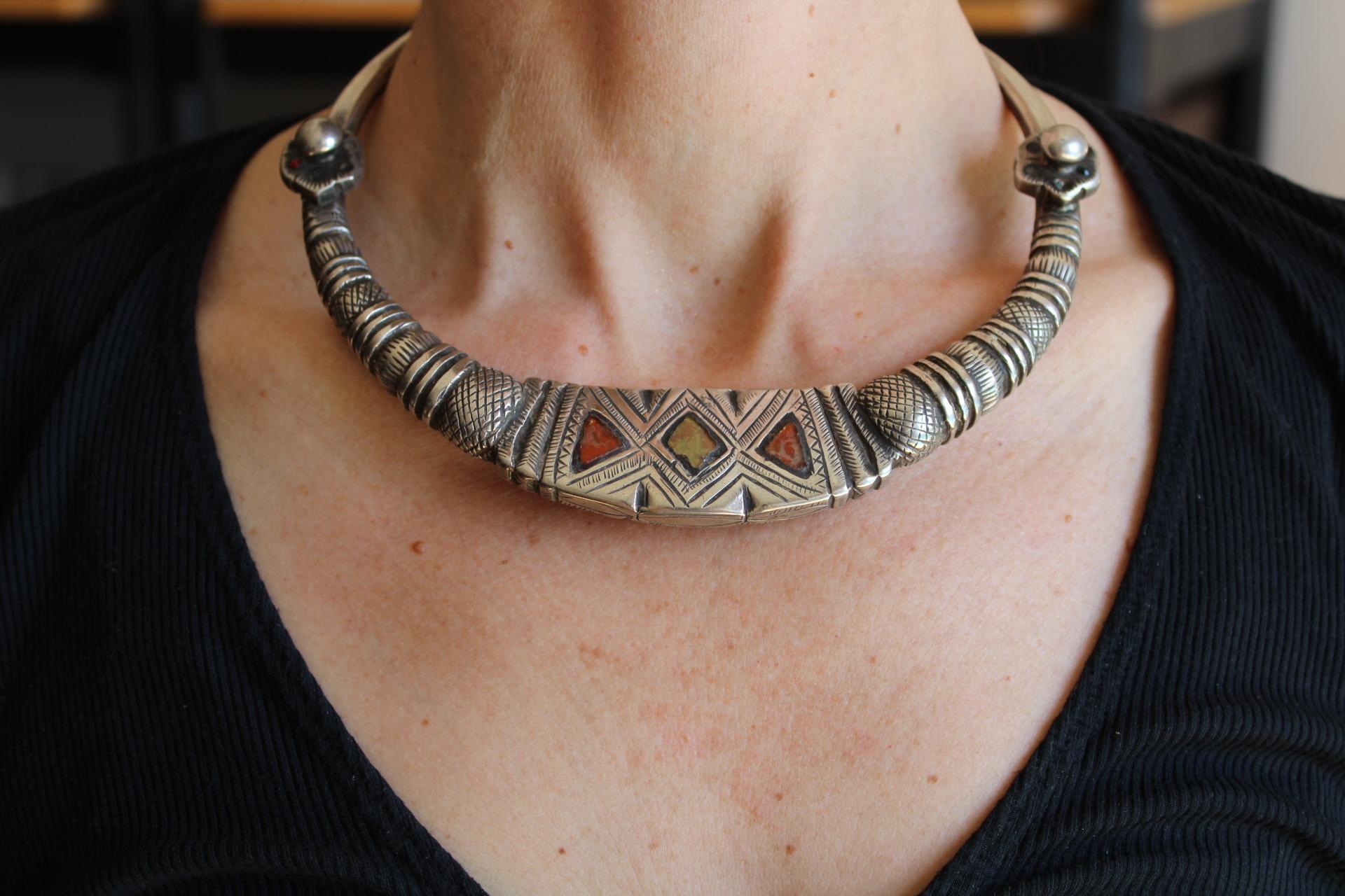 This antique silver neck torque, hand beaten and etched with glass inlays, is a unique find!  This type of torque was worn by married women in Nuristan Afghanistan and Swat valley in Pakistan.