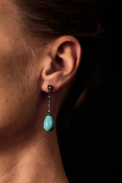 Boucles d'oreilles en argent et or 18 carats, turquoise antique et diamants taillés en rose.