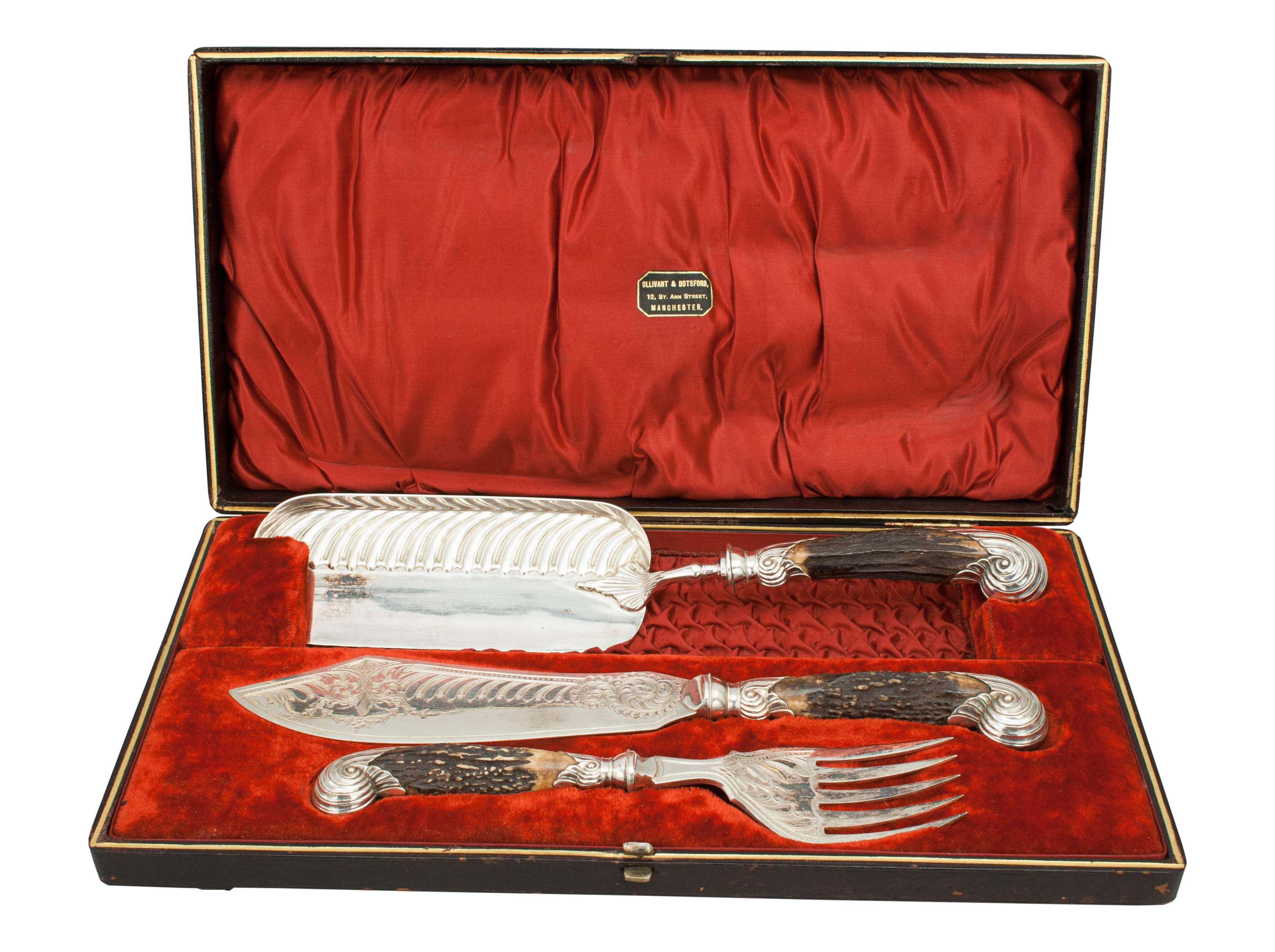 Antler handles with silver mounts
A wonderful Victorian, carving set in original box lined with red silk and crushed velvet lining. The set made from steel with Deer antler handles mounted with ornate silver fittings. 
A very good and rare