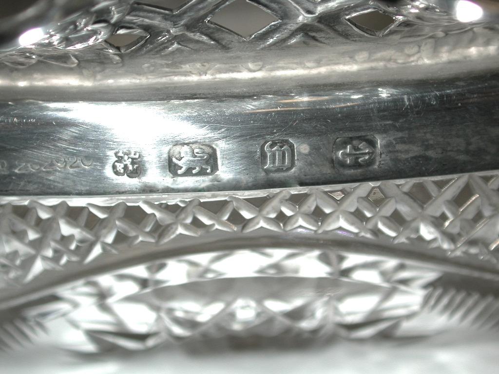 Antique silver and cut glass fruit bowl, dated 1896, Birmingham
Heavy quality embossed and hand pierced silver edge with hand cut crystal base.
Made by Thomas Latham and Ernest Morton
Registered design no 202920.
  