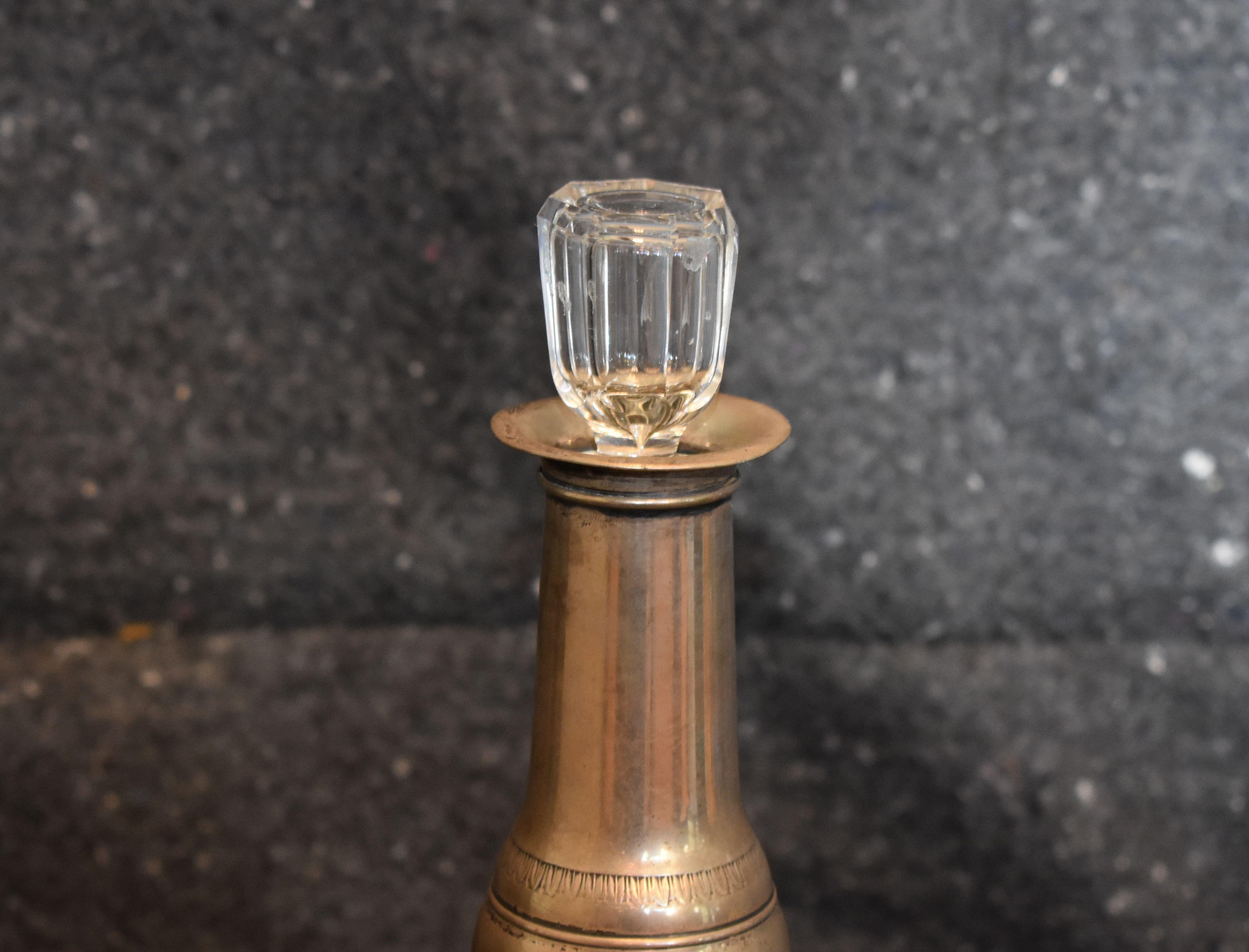 Silver and glass decanter with original patina.