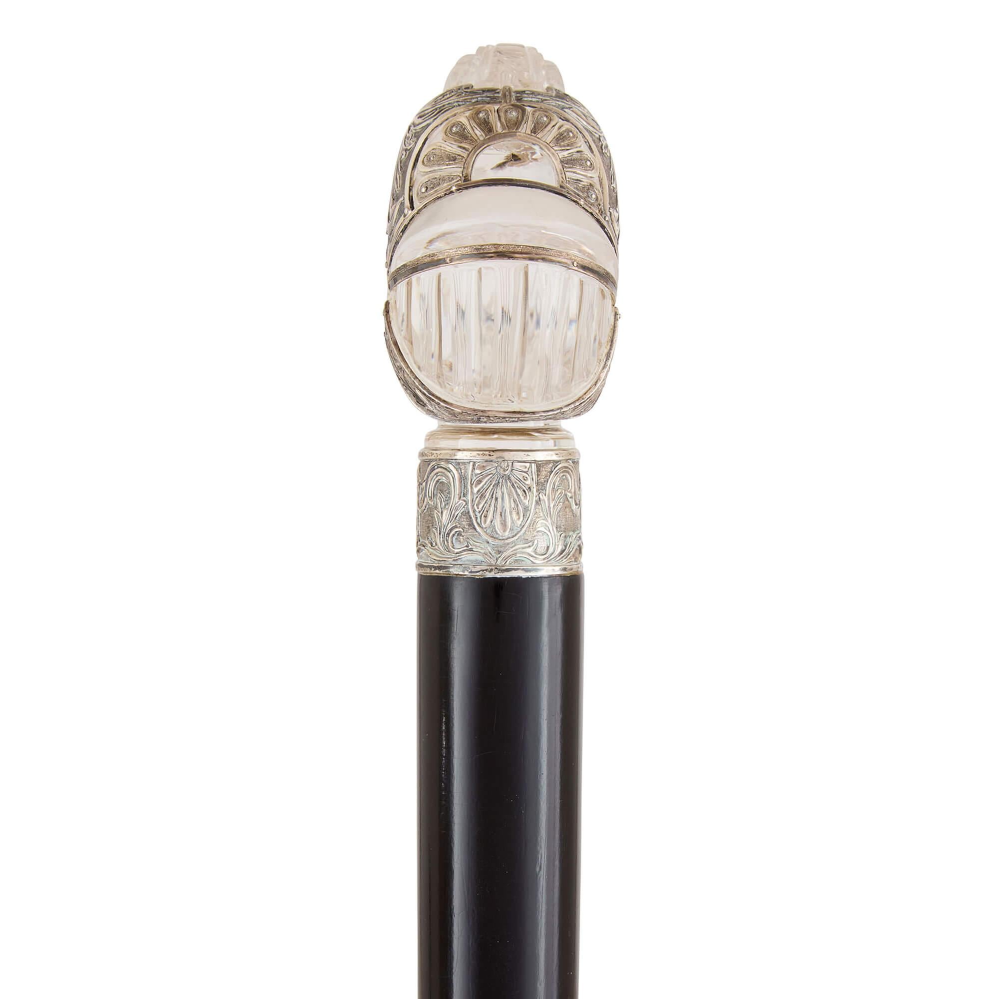 Antique silver and rock crystal walking stick  
Continental, c. 1900 
Height 90.5cm, width 7.5cm, depth 4.5cm 

This early 20th century walking stick showcases an extraordinary knight’s head, masterfully crafted from silver and rock crystal. 

The