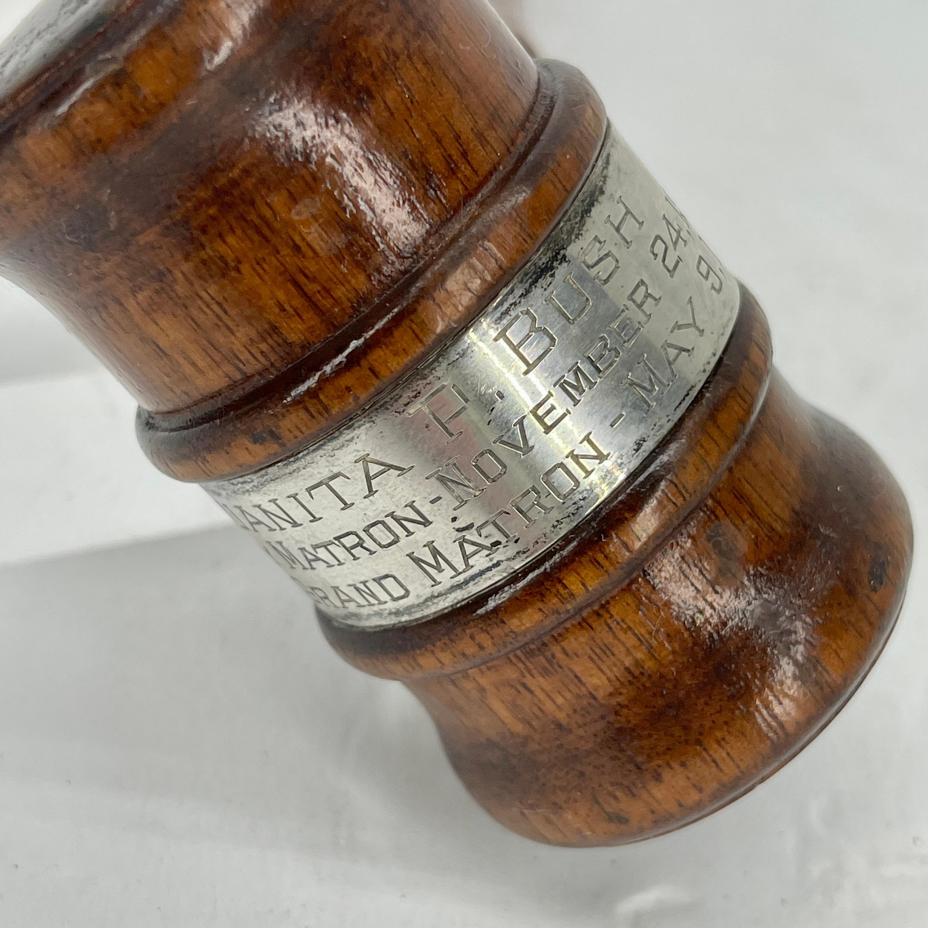 Antique sterling silver and wood gavel or auction hammer. 
The gavel is engraved with Judge's name and is a commemorative hammer or gavel for the years of service of the judge. The walnut wood is in good condition and the sterling silver engraved