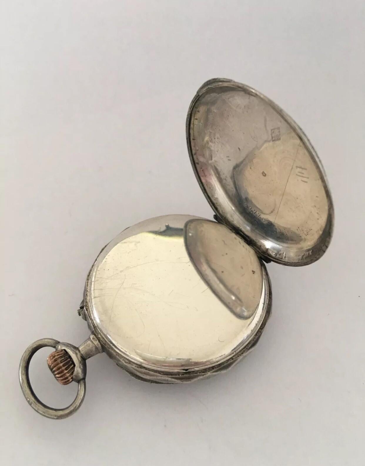silver engraved pocket watch