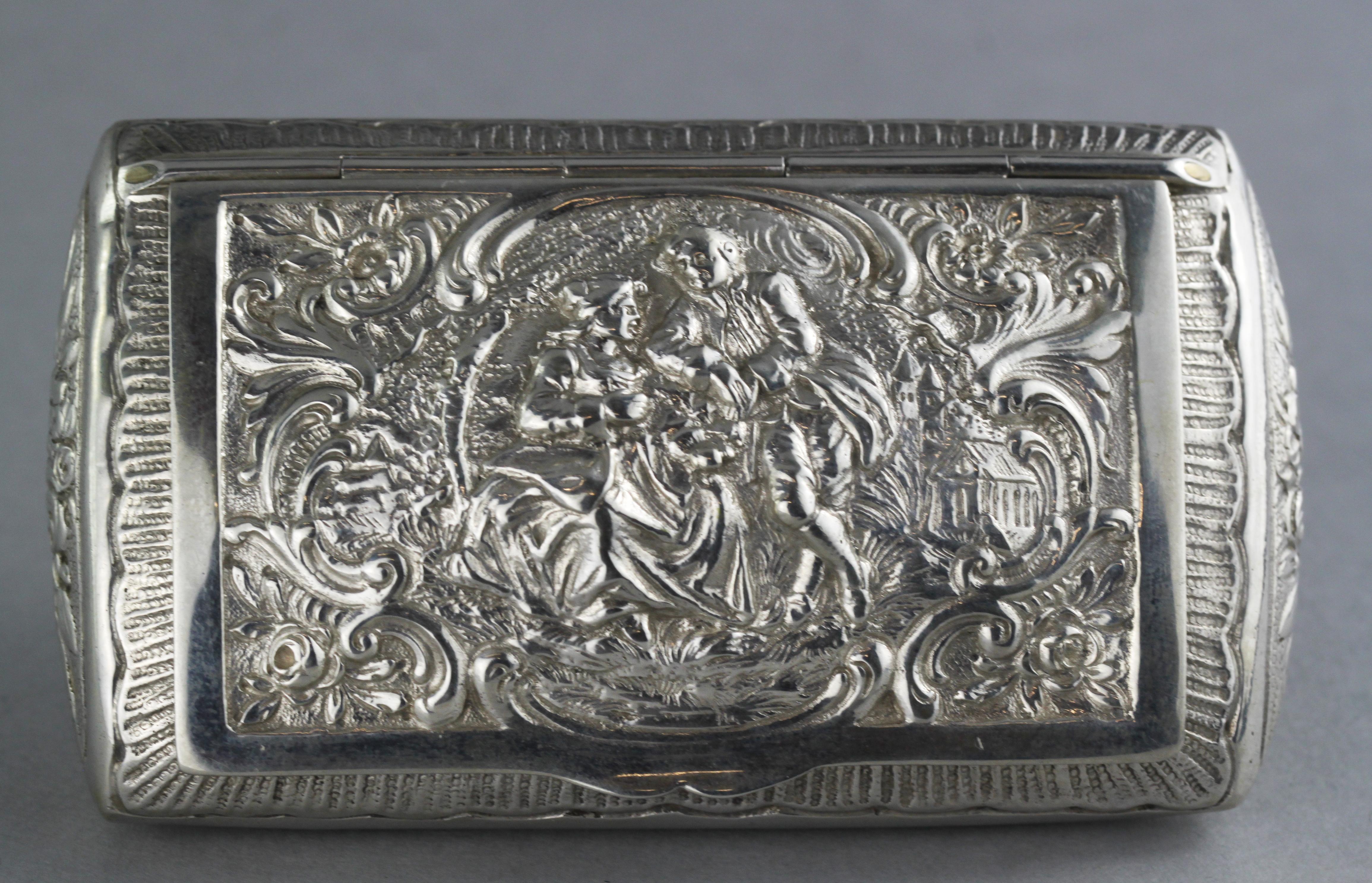 Antique silver Belgian early 20th century snuff box. It has been beautifully engraved with flowers and scrolls. Richly decorated box in a unique shape.The inside has been gilded.

Made in Belgium early 20th century.

Hallmarked 835