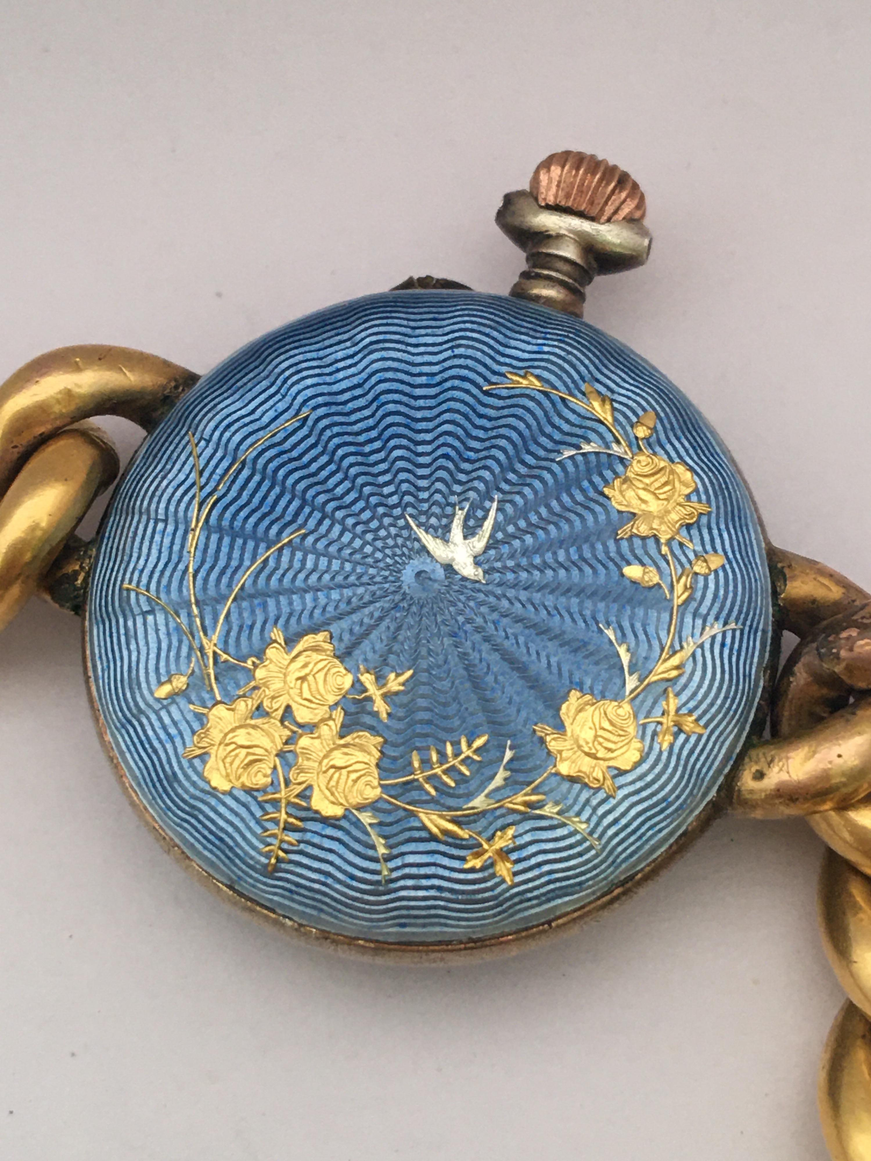 This beautiful antique silver blue enamel ladies trench watch is not working but the balance is good and spinning when move. I think it needs a service which reflect the price. Visible signs of ageing and wear with light marks on the glass as shown,
