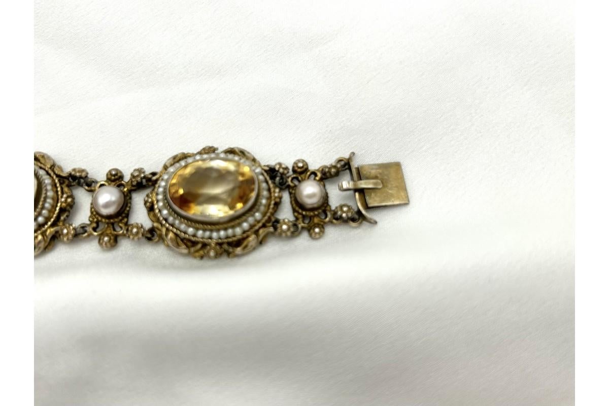 Antique silver bracelet with citrine and pearls, circa 1900. 1
