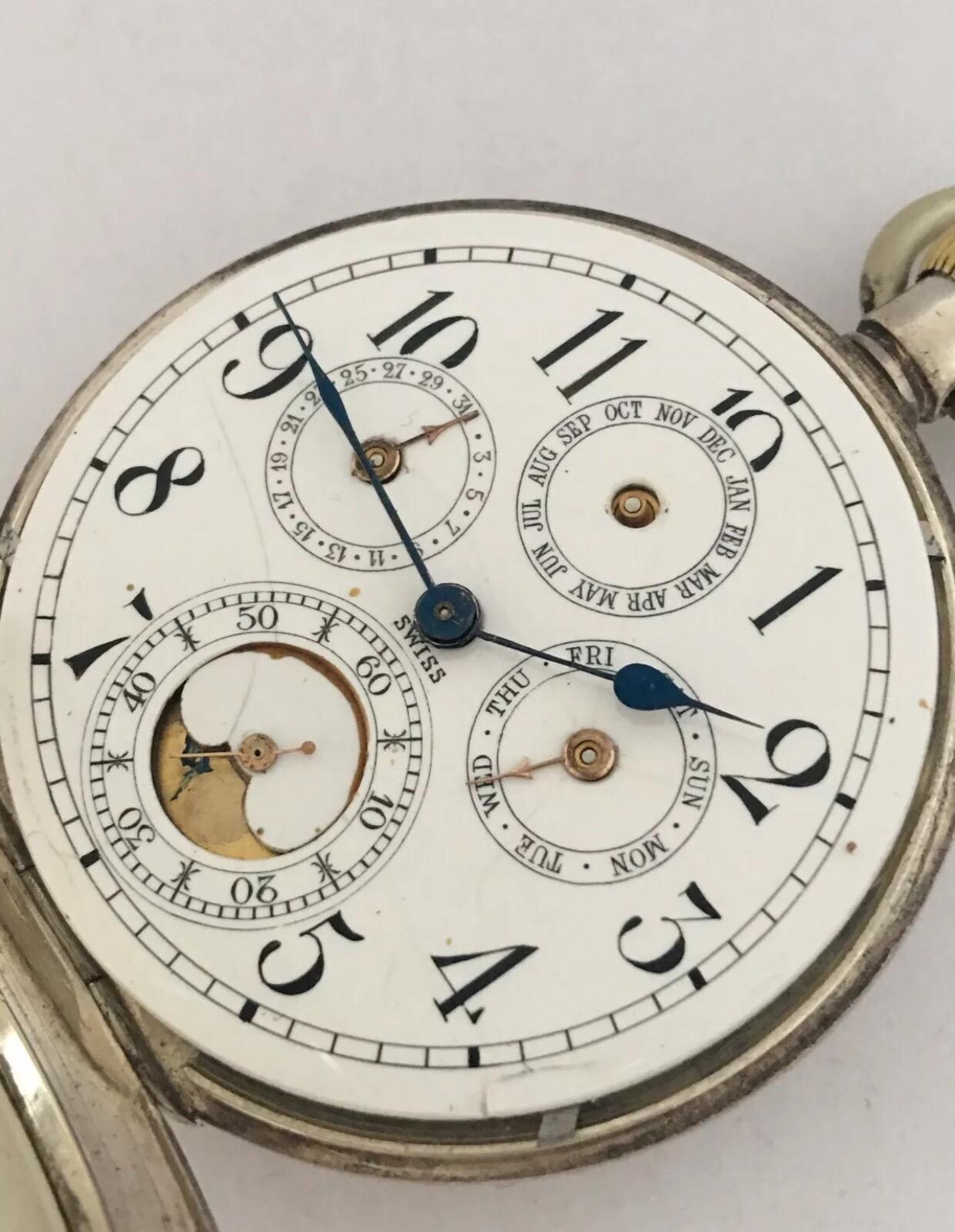 
Antique Silver Swiss moon-phase Calendar Pocket Watch.


This watch is working and ticking nicely. There is a hairline crack on the dial, glass scratches and cloudy. And a bit bend on the back case cover as shown on the photos. Months hand missing.