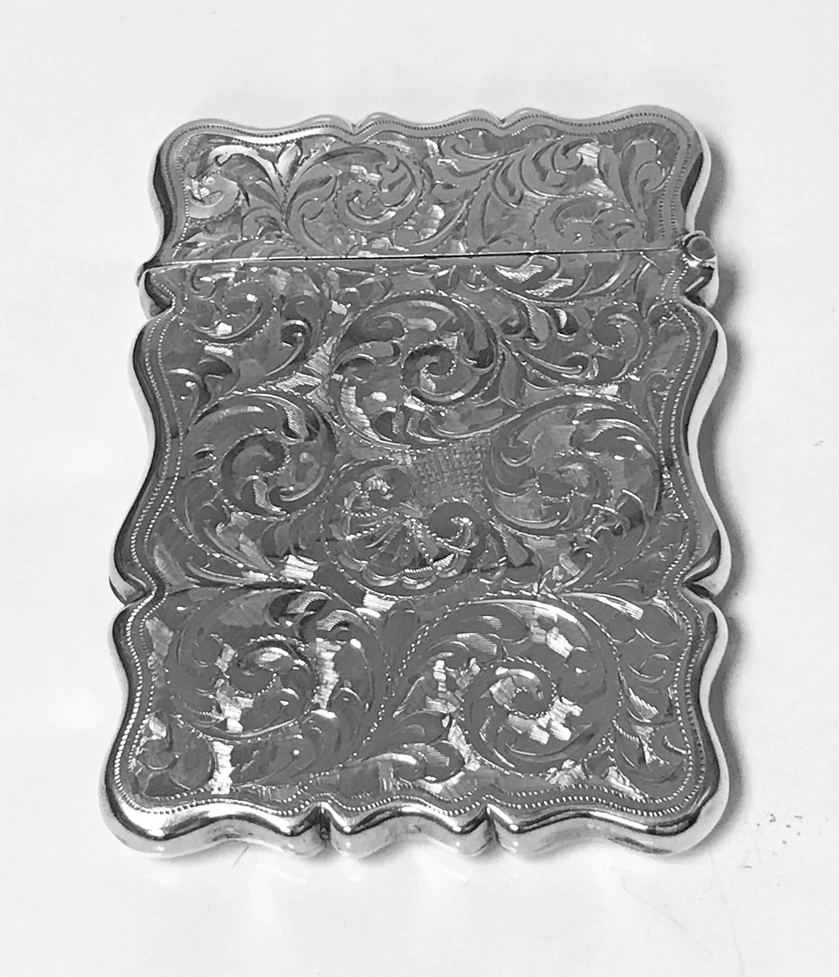 Antique silver card case, Birmingham 1906, Joseph Gloster. Very finely engraved foliage. Vacant cartouche to front. Measures: 3.6 x 2.6 inches. Item weight: 60.70 grams. Fully hallmarked.