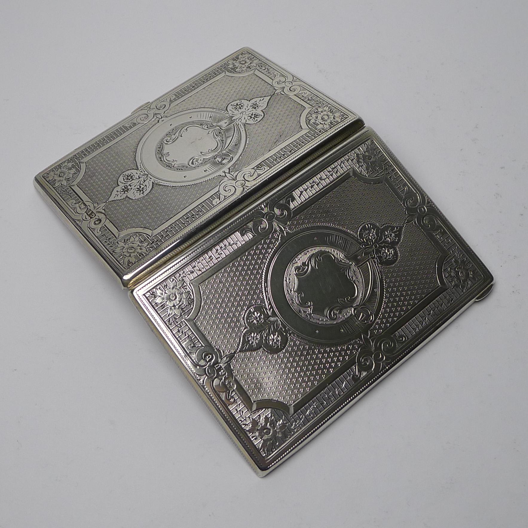 A stunning Victorian card case made by the highly collectable silversmith, George Unite. The silver is fully hallmarked for Birmingham 1876 together with the maker's initials, G U and the highly sought-after Queen Victoria's head duty mark.

The