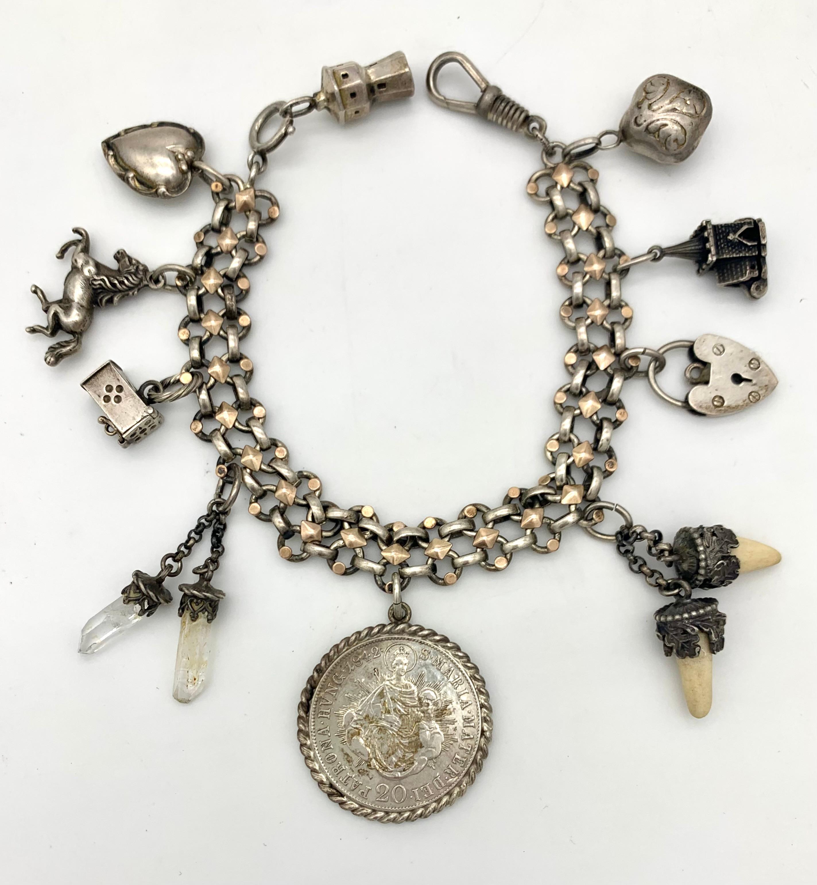 Belle Époque Antique Silver Charm Bracelet Silver 9 Charms Lighthouse Horse Heart Coin Teeth