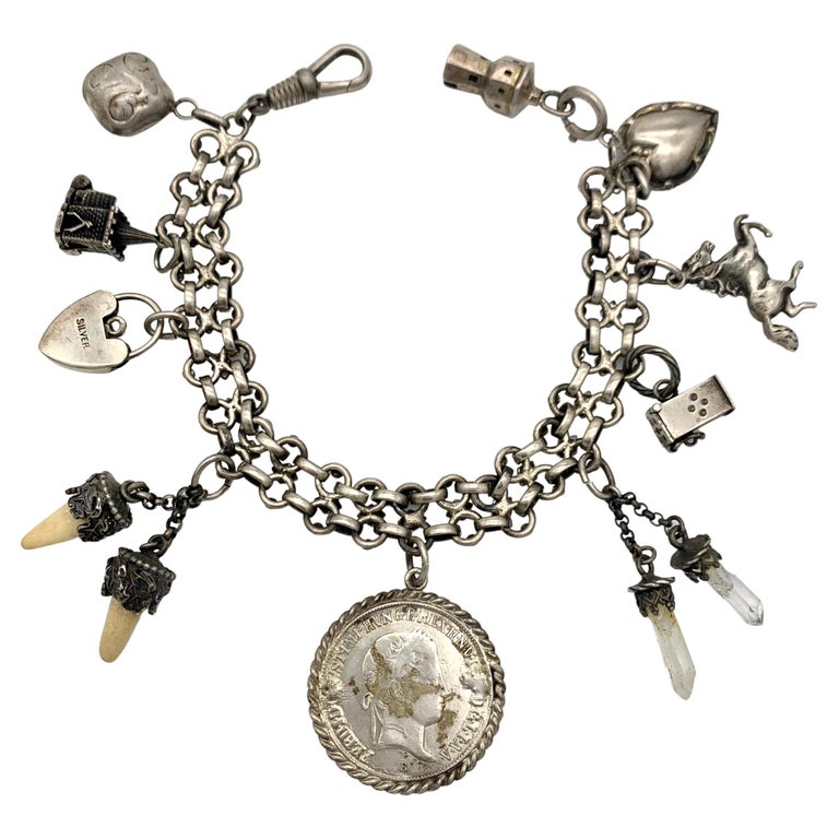 Antikes Silber-Charm-Armband Silber 9 Charms Leuchtturm Pferd Herz Münze  Teeth im Angebot bei 1stDibs