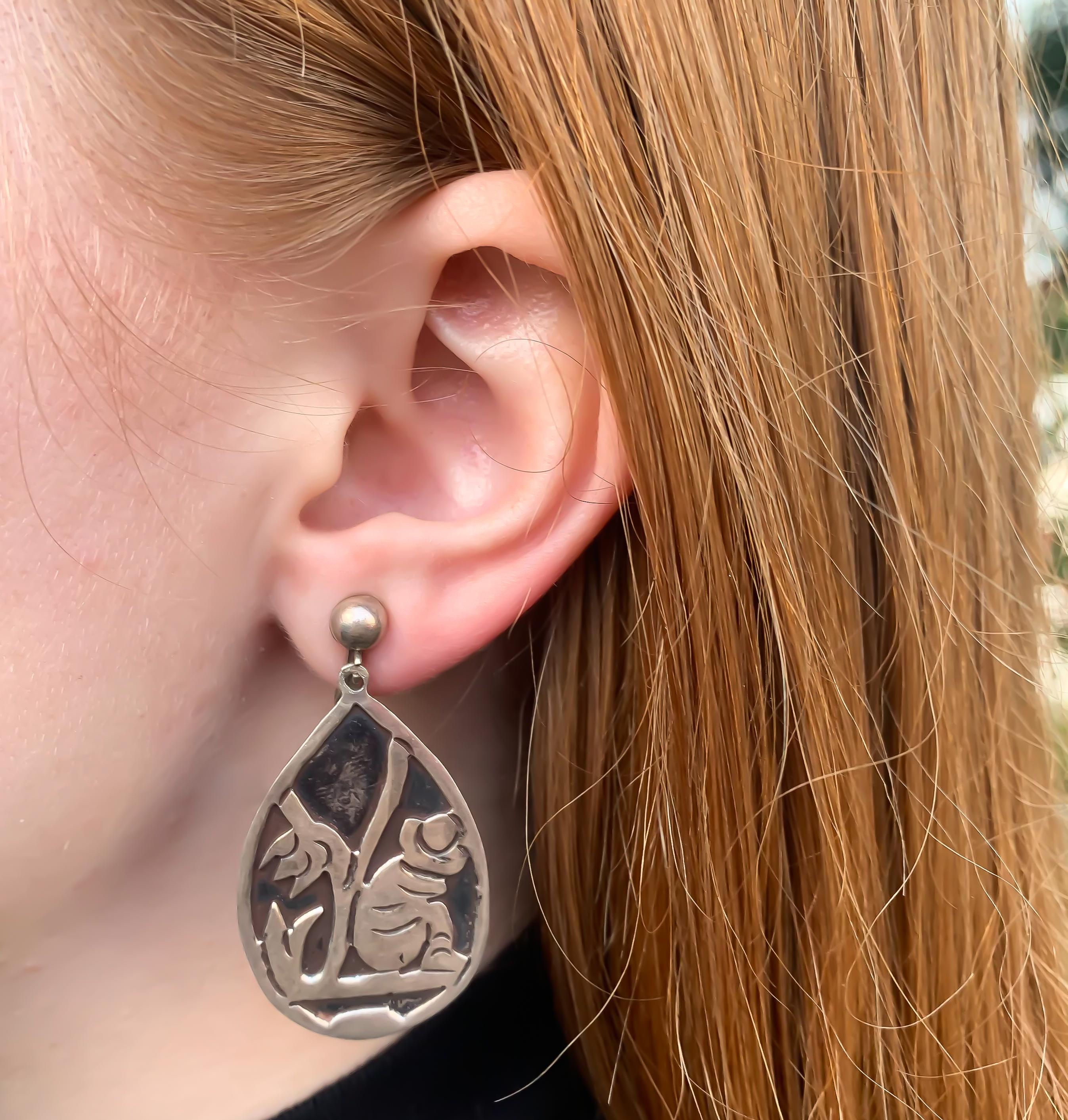 Antique 
Pair of Silver Carved Dangle Earrings 
Sitting Man by Tree Carving