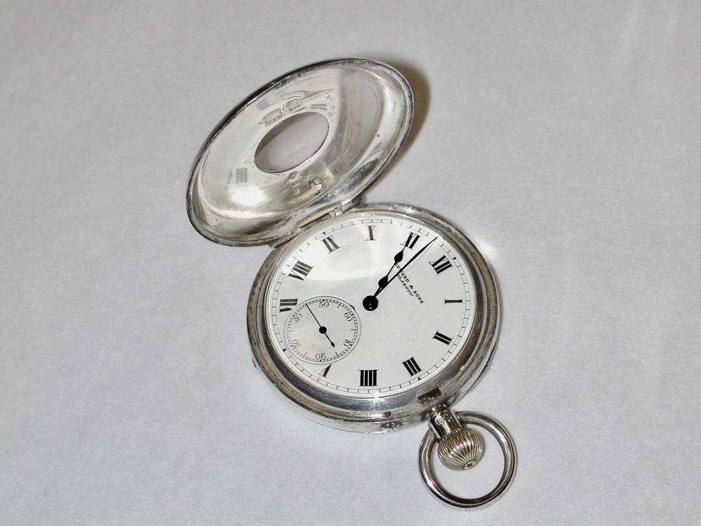 Antique silver demi-hunter pocket watch, dated 1903, Birmigham Assay.
Lovely quality pocket watch which keeps good time.
The original owners initials are on the back.
Made by Edward & Sons,makers to the King and the Admiralty, of Glasgow and