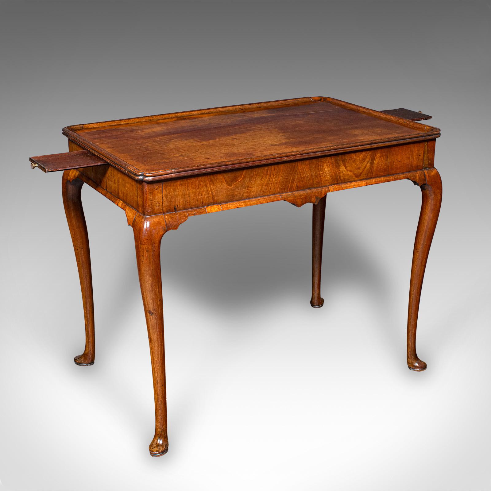 This is an antique silver display table. An English, mahogany presentation side table with candle slides, dating to the Georgian period, circa 1760. 

A delightful piece of country house furniture, offering superb colour, elegance and