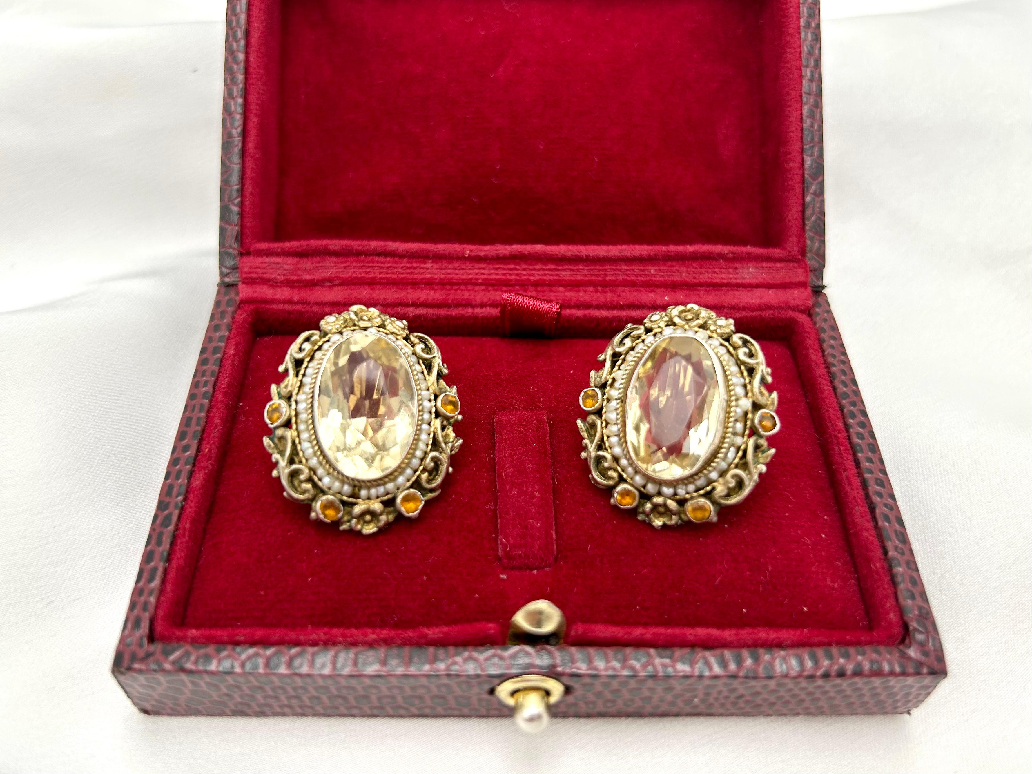 Oval Cut Antique silver earrings with citrines, garnets and pearls, circa 1900. For Sale