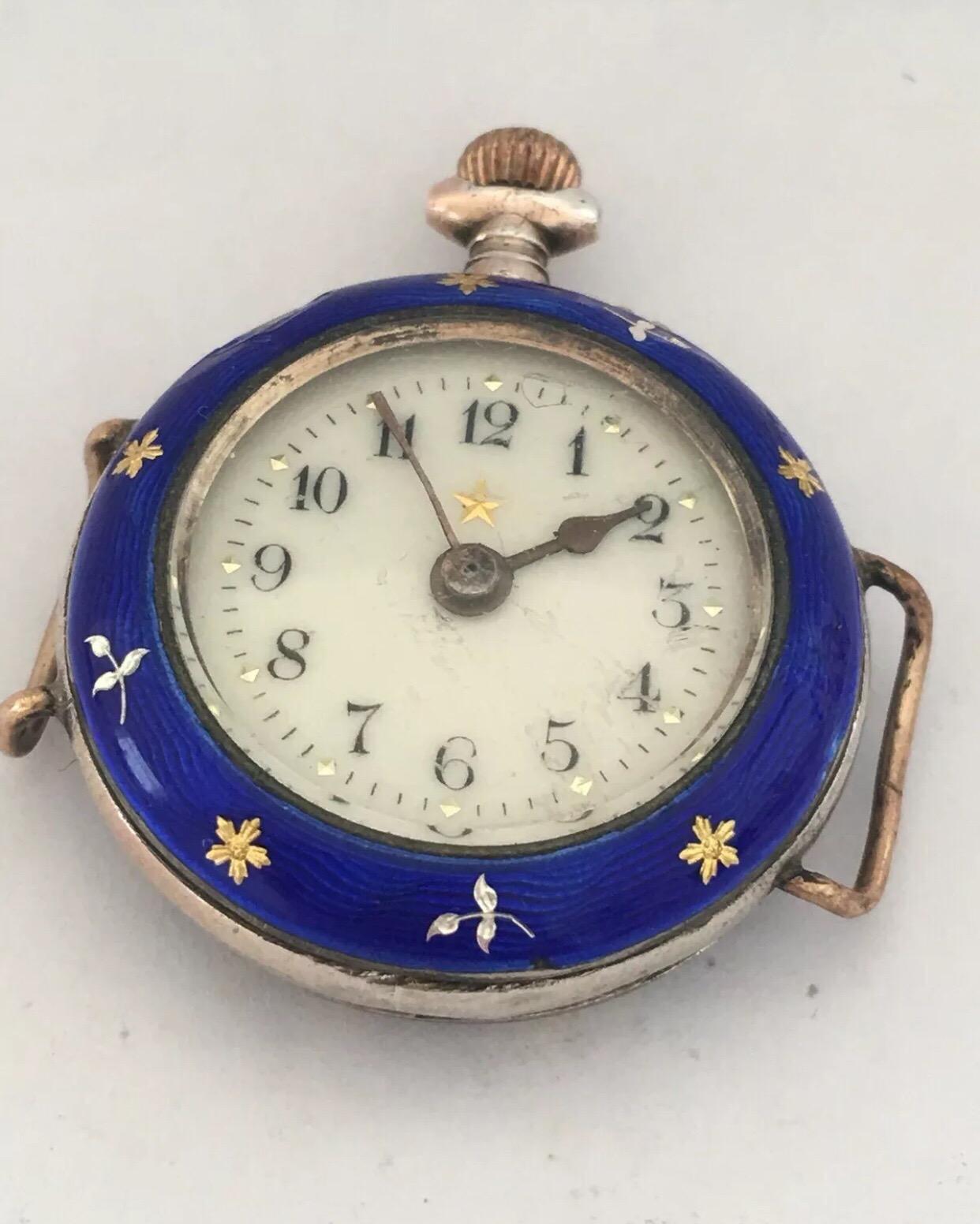 
Antique Silver Enamel Trench Watch.

This watch is working and ticking well. Visible tiny chipped on enamel at the side case as shown on photos. It needs a strap to be able to wear it. Please study the photos carefully as form part of the