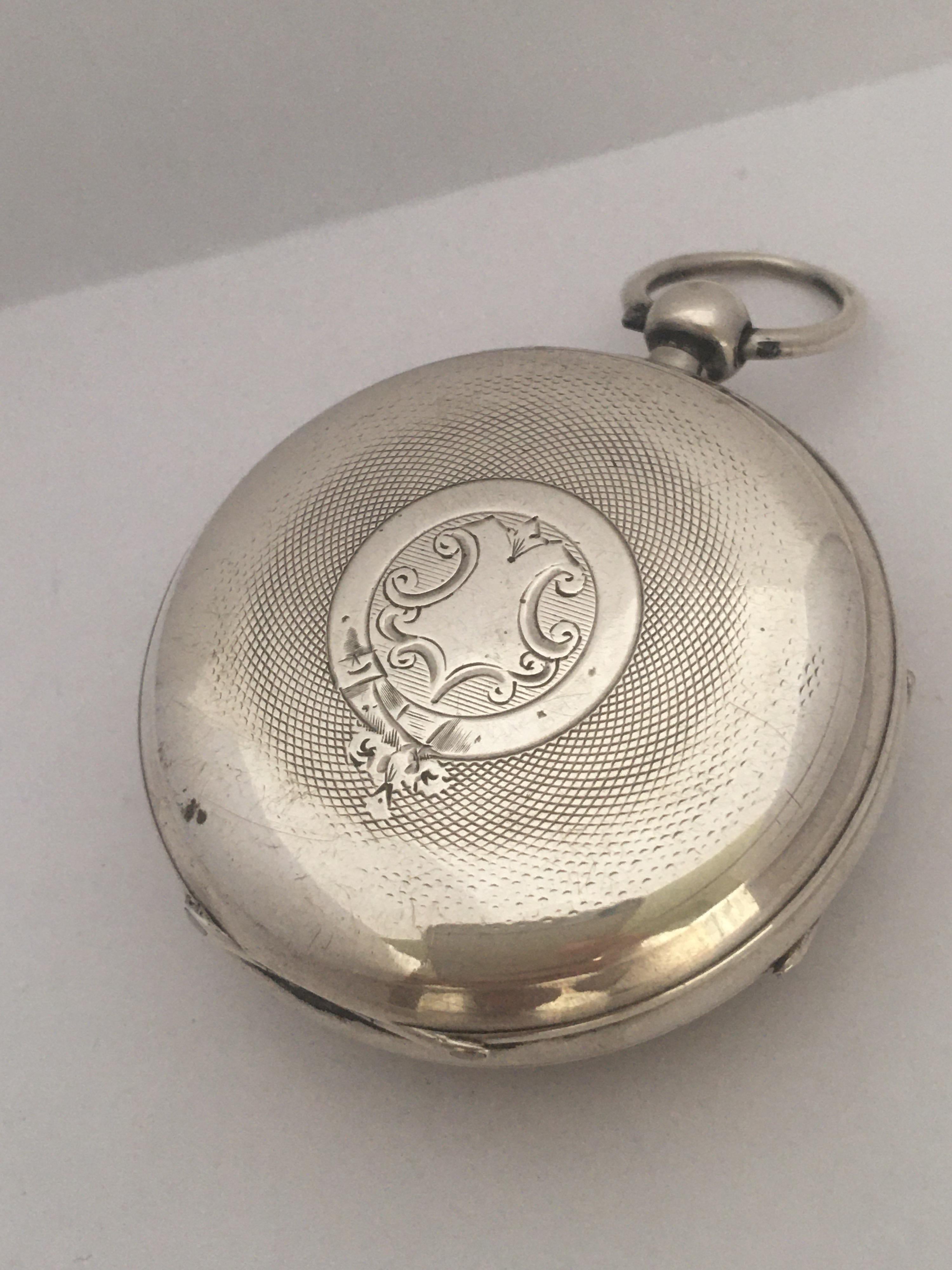 This beautiful antique Silver engine turned cased English Lever pocket watch is in good working condition and it is running well. It comes with a winding key.

Please study the images carefully as form part of the description. 