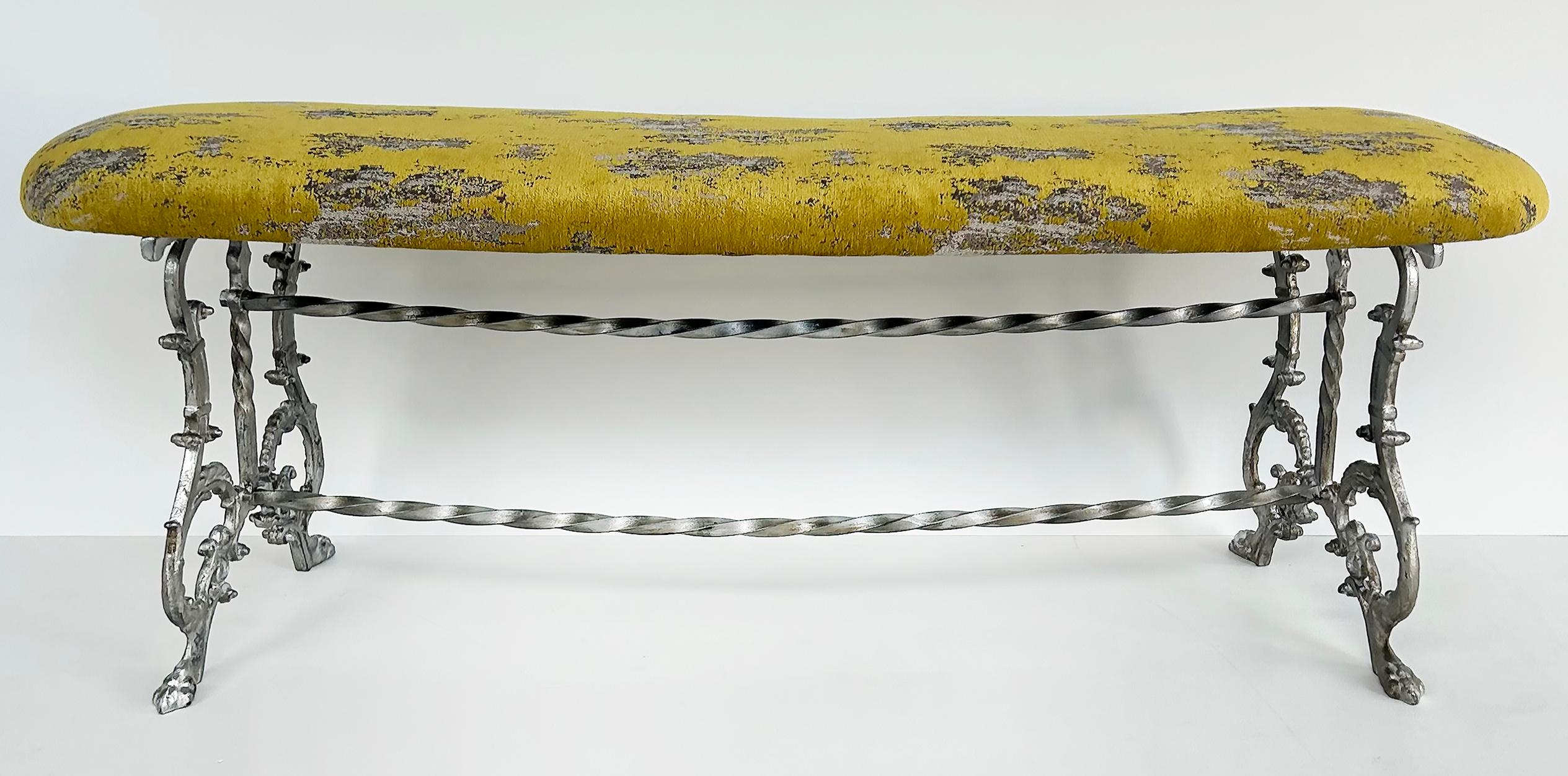 Antique Silver Gilt Cast Iron Curved Bench with Newly Upholstered Seat Cushion

Offered for sale is an early 20th-century silver gilt cast iron curved bench with a newly upholstered seat cushion. The bench has been completely restored and is in
