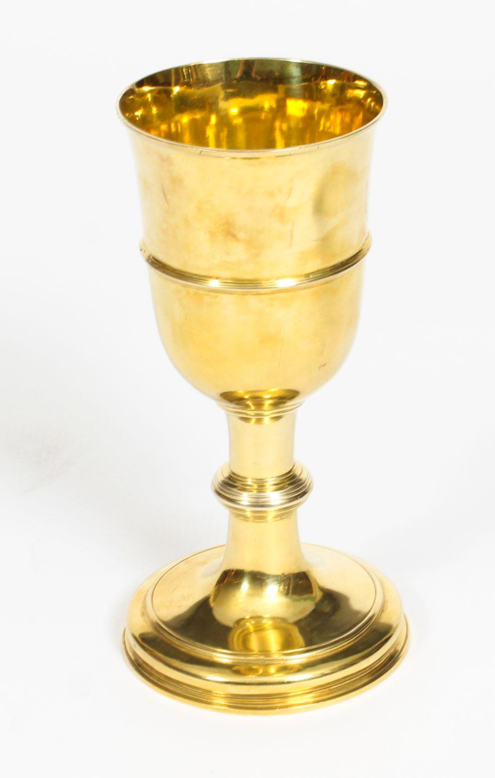 This is a fabulous antique George II English silver gilt chalice bearing hallmarks for London 1745 and the makers mark of the world renowned silversmith Paul de Lamerie. 

Bearing the maker's mark for Paul de Lamerie, P.L in script under a crown