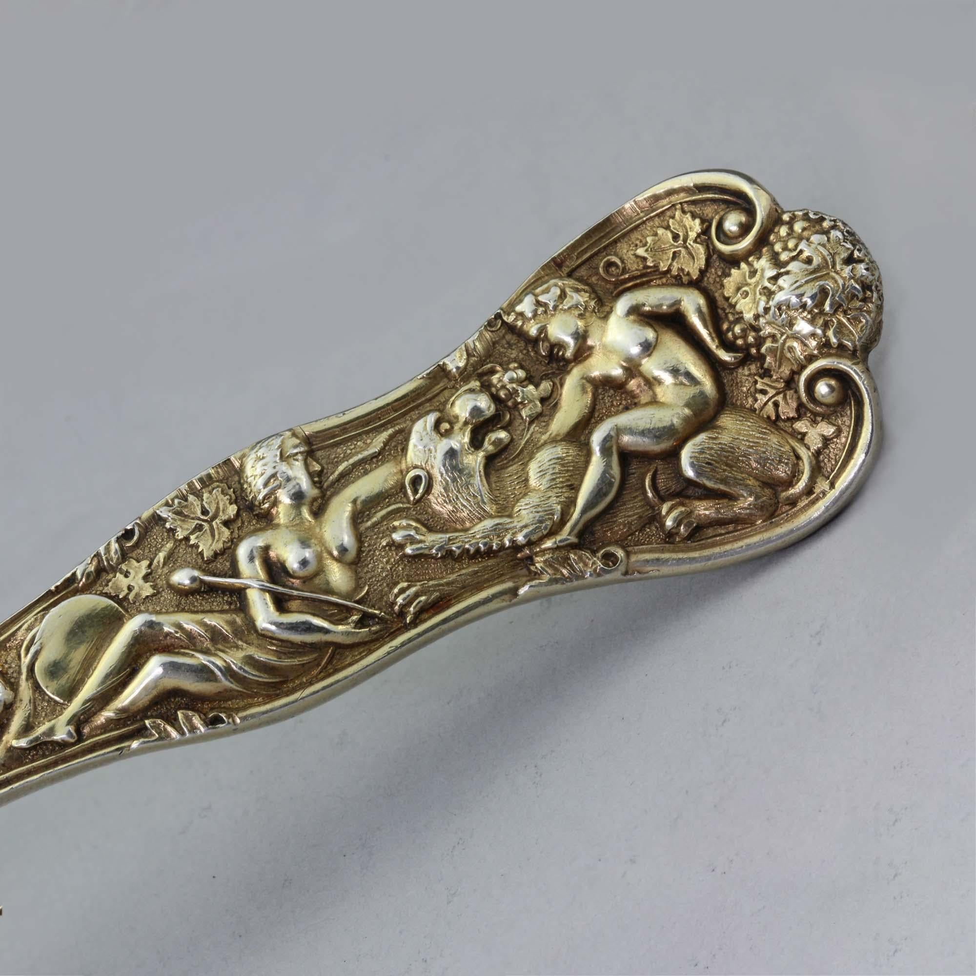 European Antique Silver Gilt Sugar Sifting Spoon with Figural Decoration For Sale