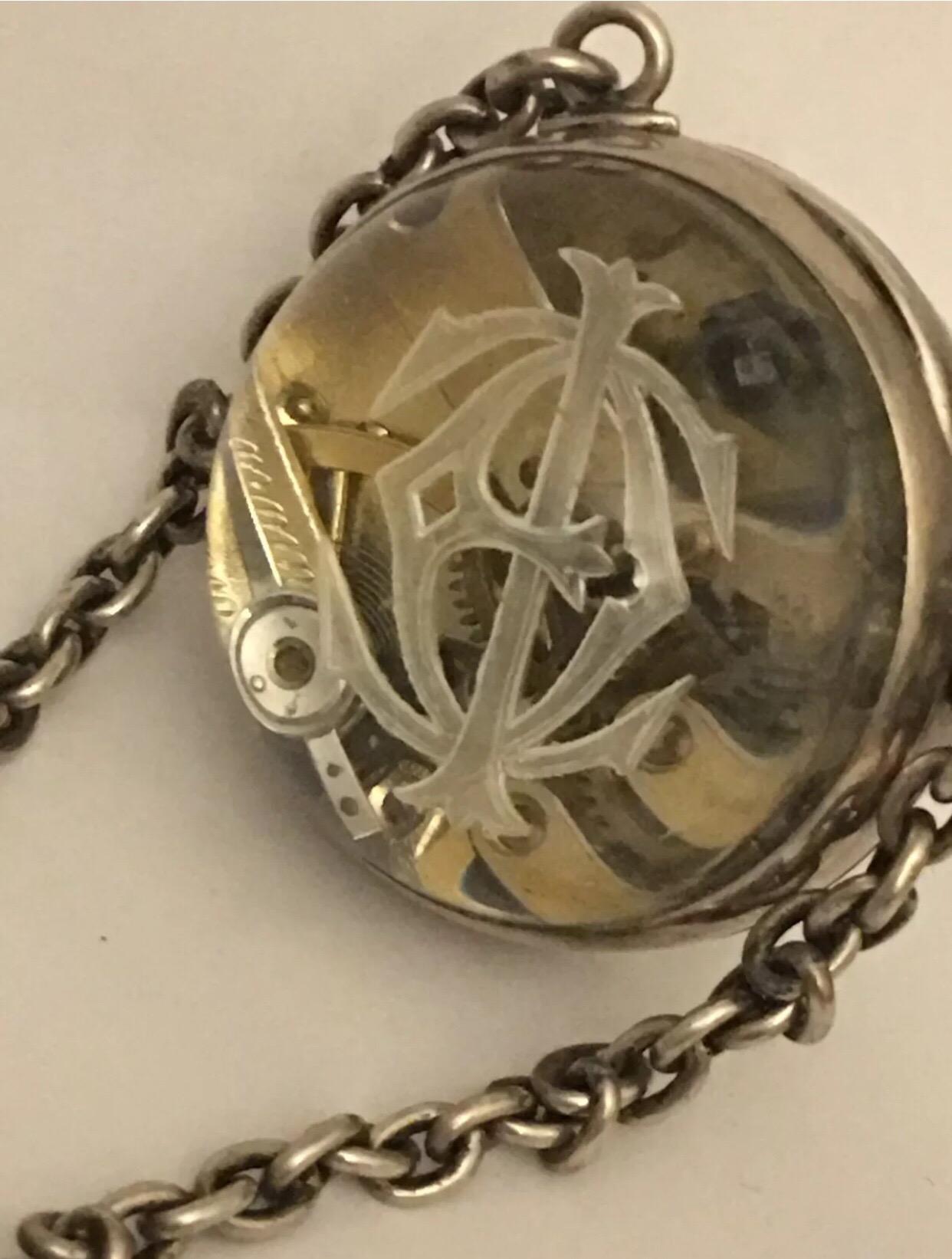 
Rare Antique Silver glass ball pocket watch with matching Silver Glass chatelaine.


This beautiful piece is in good working condition and it is ticking well. Visible signs of ageing and wear. The watch is measured 32mm diameter. Please study the