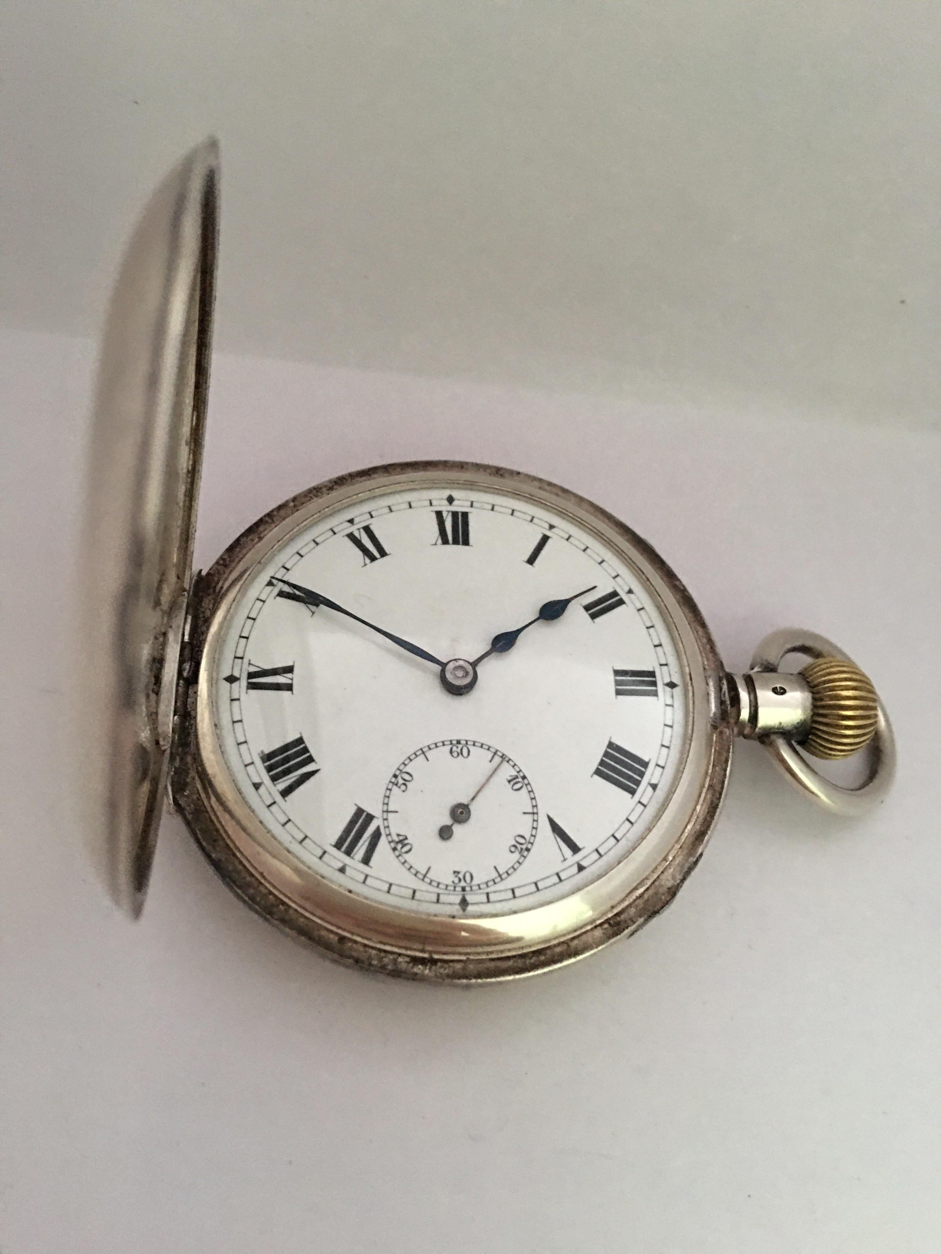 This beautiful antique 50mm keyless hand-winding Silver pocket watch is in good working condition and it is ticking well. It is recently been serviced and keeps a good time. Visible signs of ageing and wear with light scratches on the glass and on